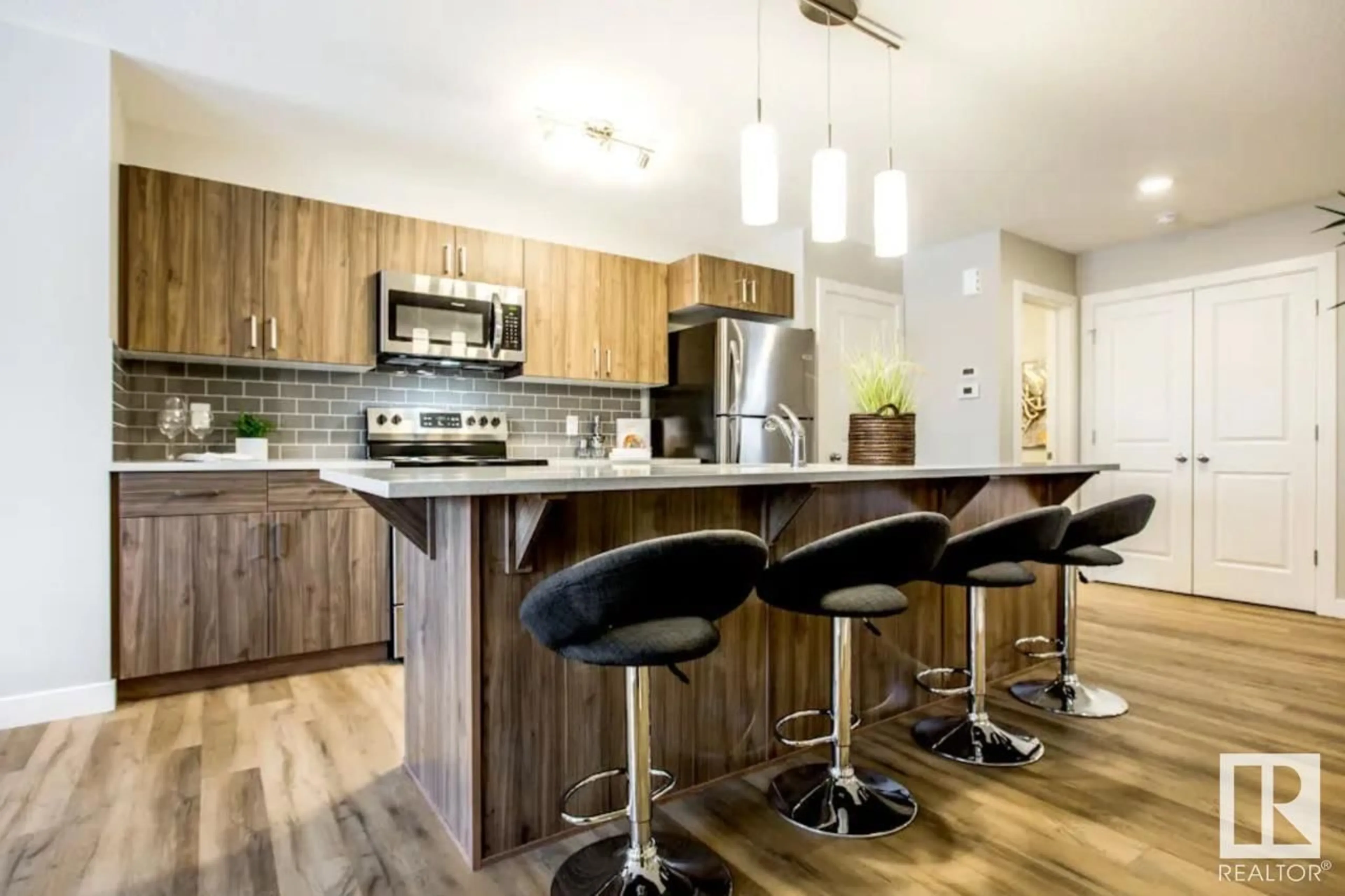 Open concept kitchen, wood/laminate floor for SW - 315 26 ST, Edmonton Alberta T6X3J1