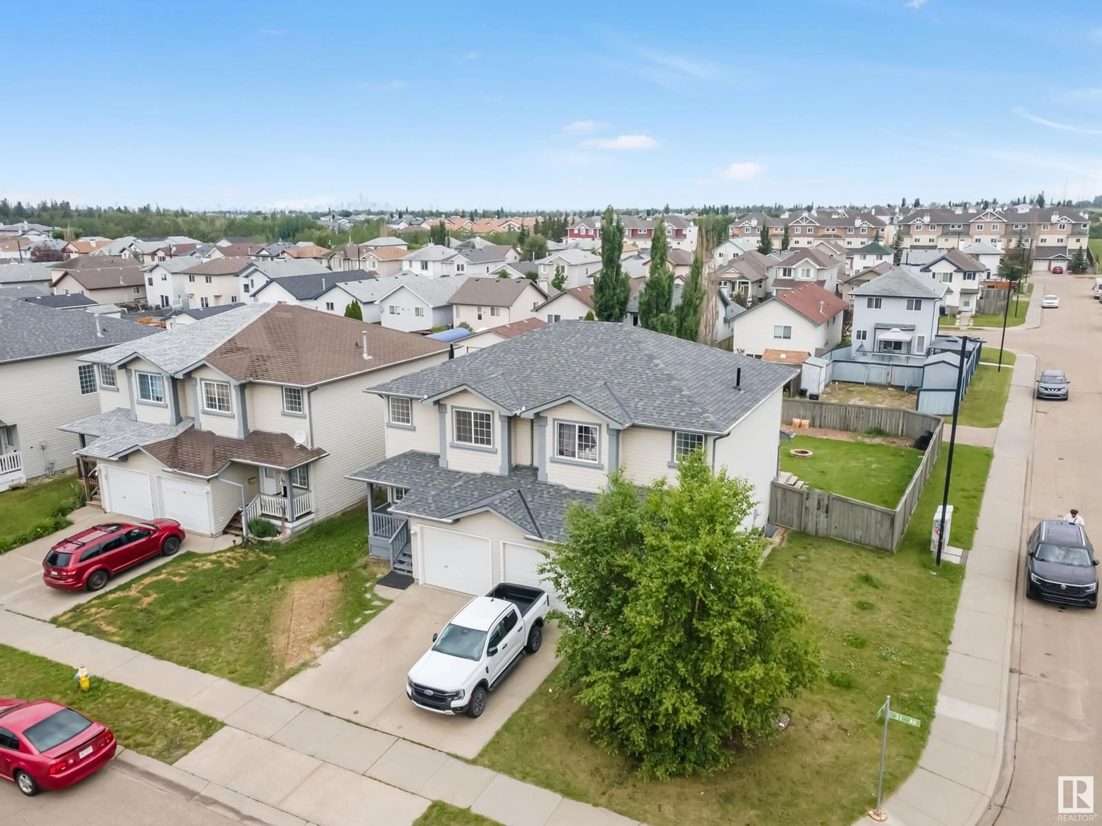 A pic from outside/outdoor area/front of a property/back of a property/a pic from drone, street for 3008 31 AV, Edmonton Alberta T6T1W9