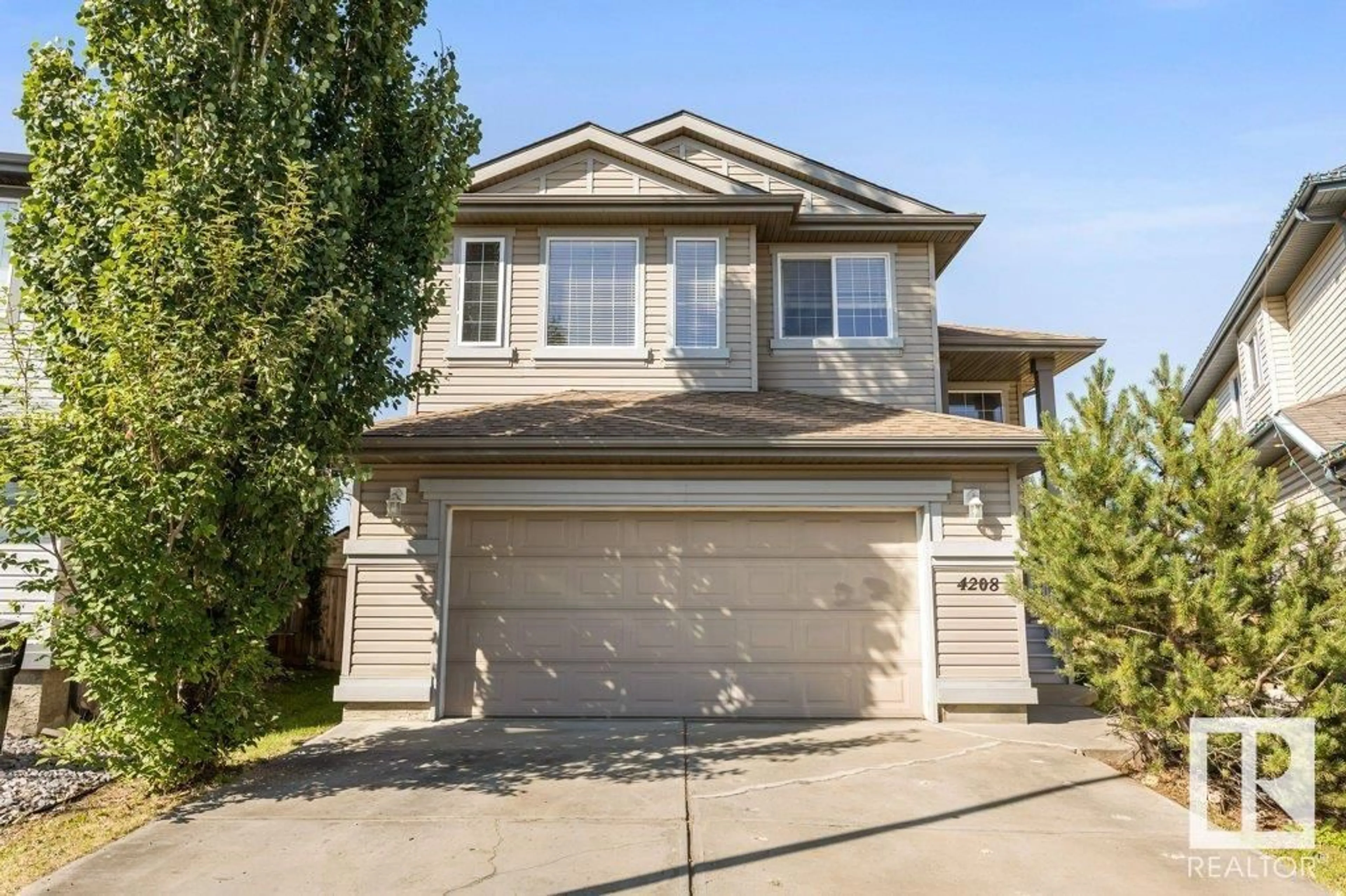 Home with vinyl exterior material, street for 4208 162 AV, Edmonton Alberta T5Y0H8