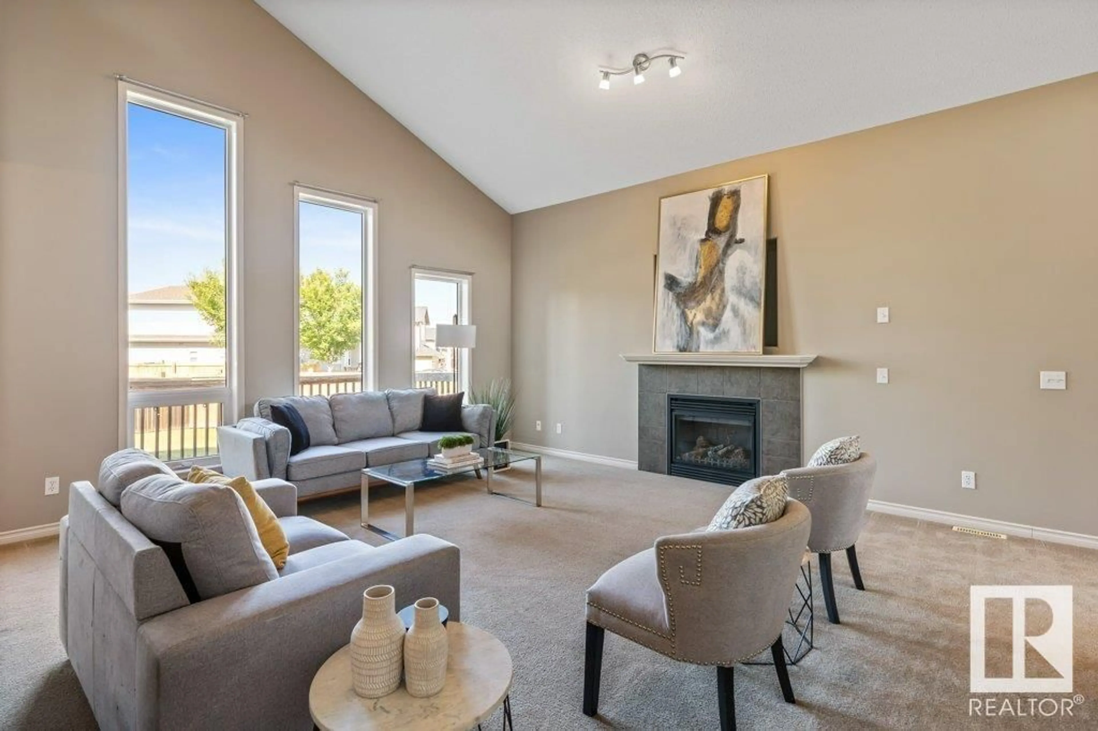 Living room with furniture, unknown for 4208 162 AV, Edmonton Alberta T5Y0H8