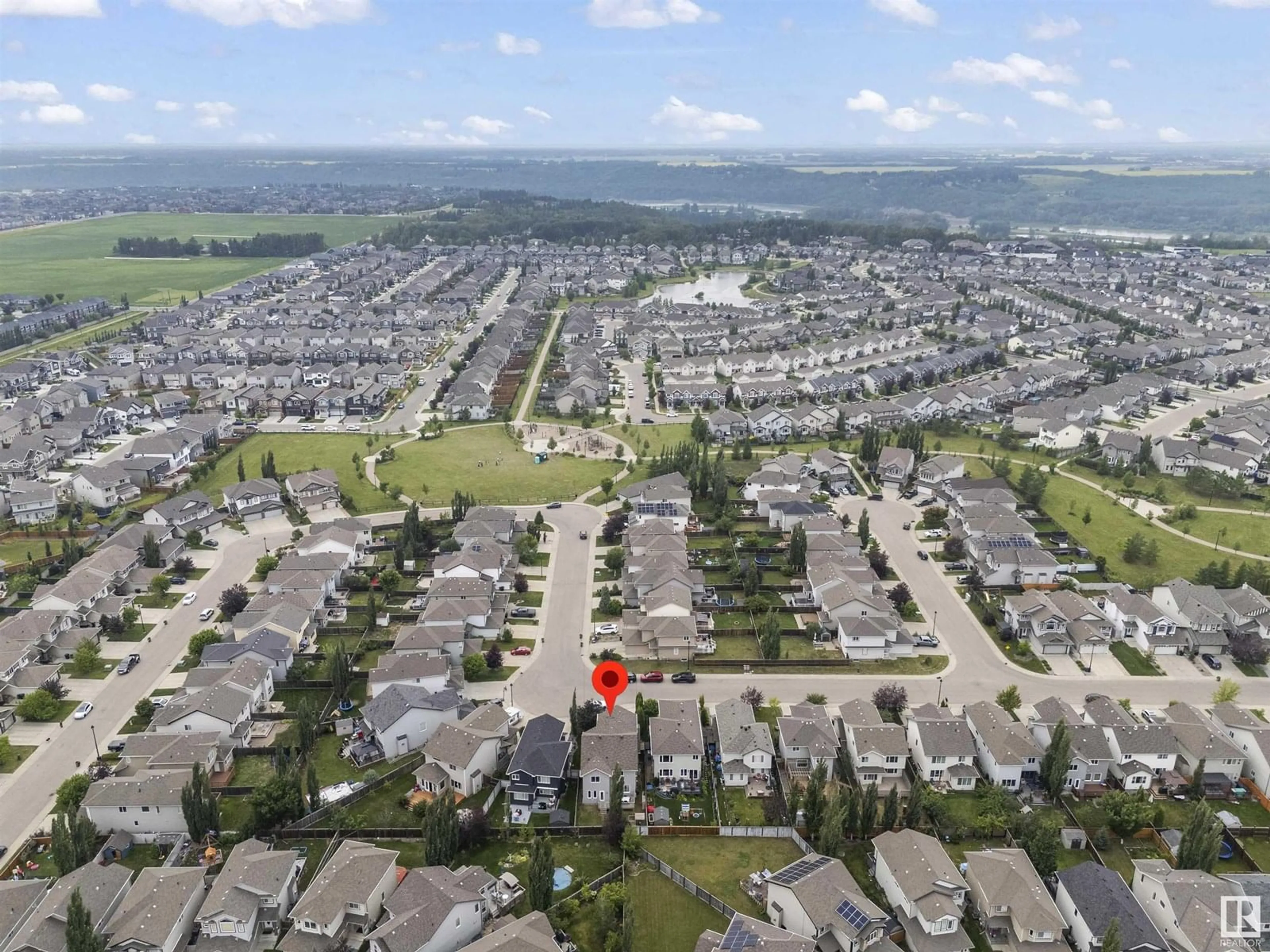 A pic from outside/outdoor area/front of a property/back of a property/a pic from drone, mountain view for SW - 753 173B ST, Edmonton Alberta T6W0M9