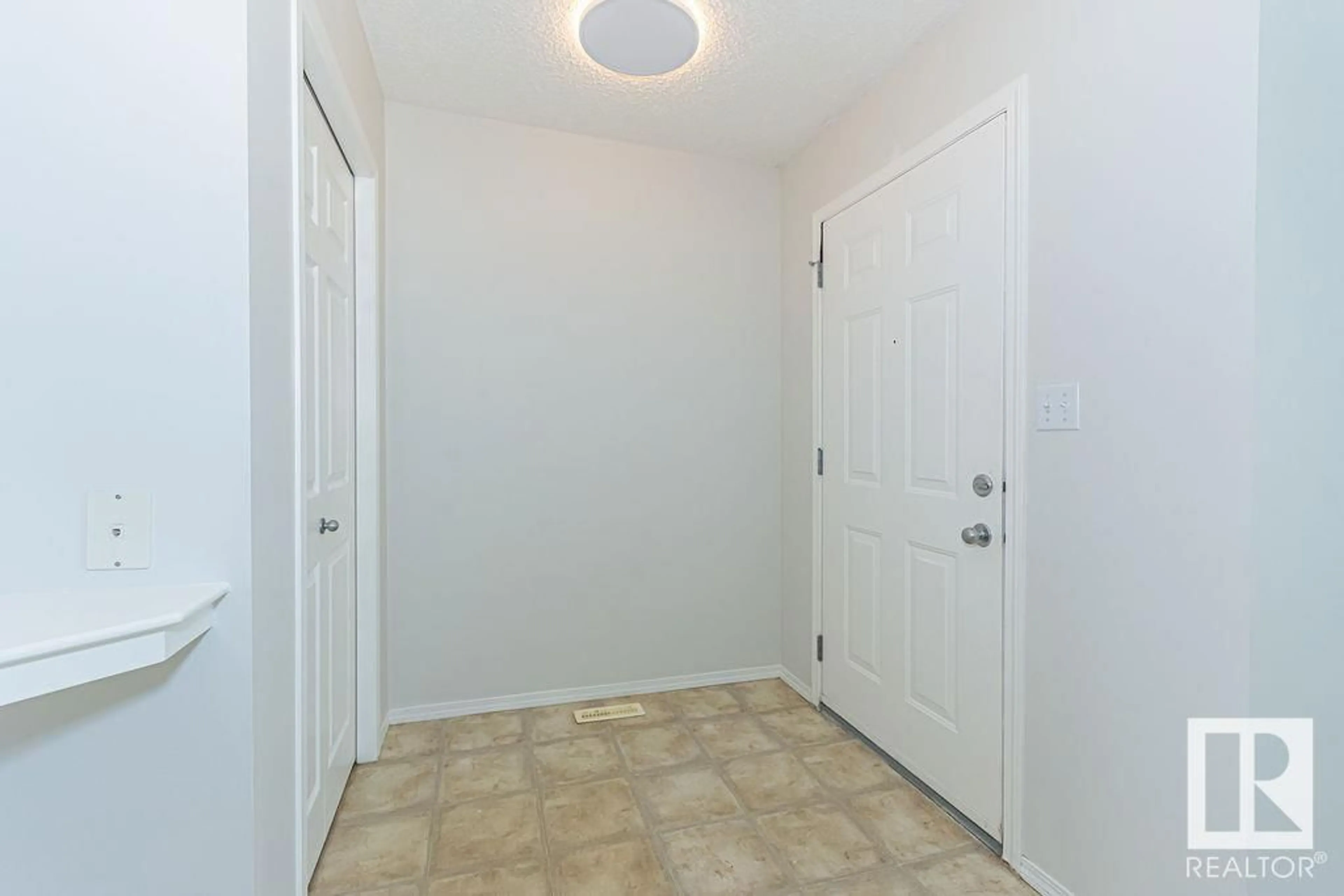 Indoor entryway for 4419 152 AV, Edmonton Alberta T5Y3C3