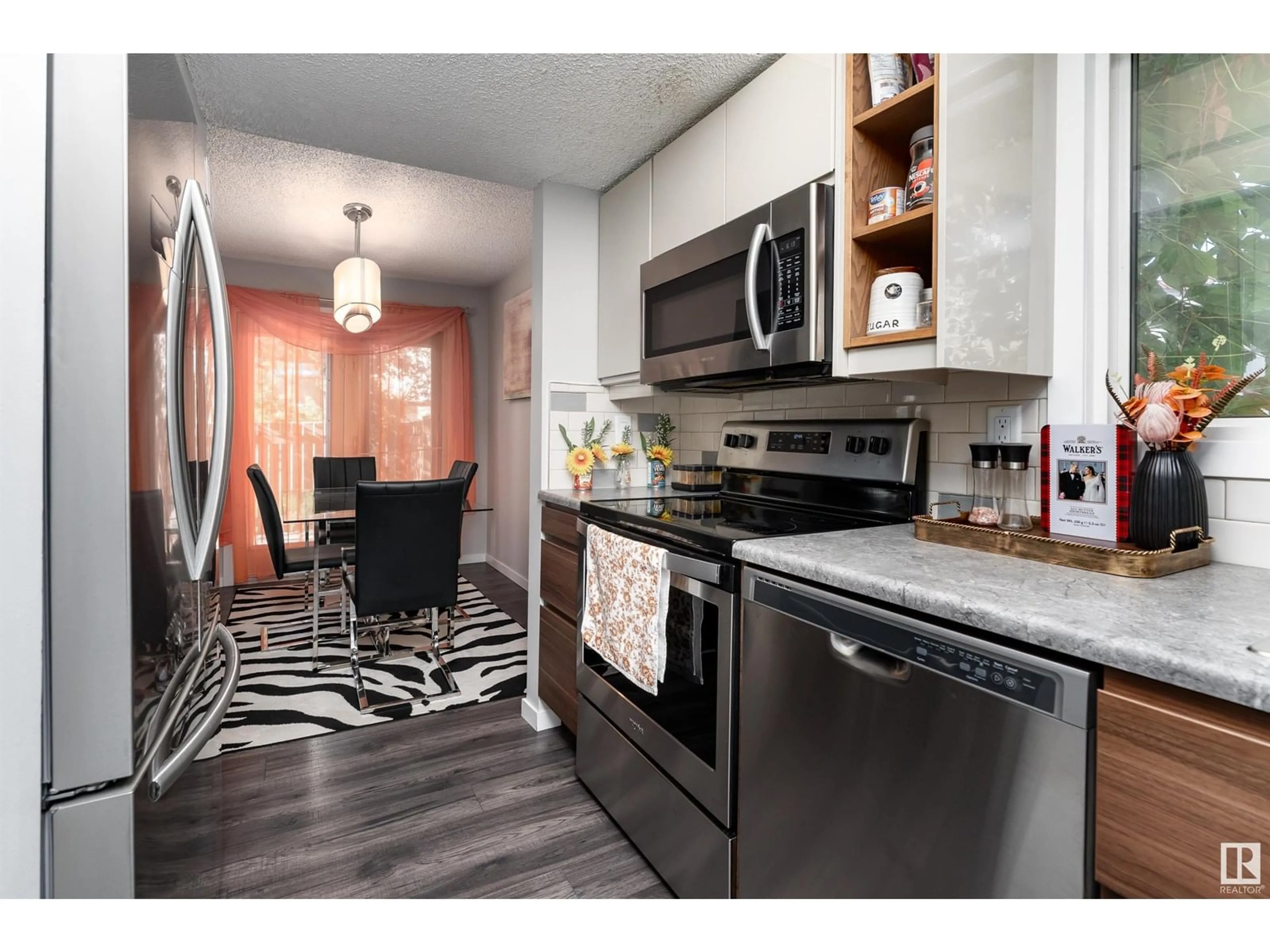 Open concept kitchen, unknown for 13841 24 ST, Edmonton Alberta T5Y1K1
