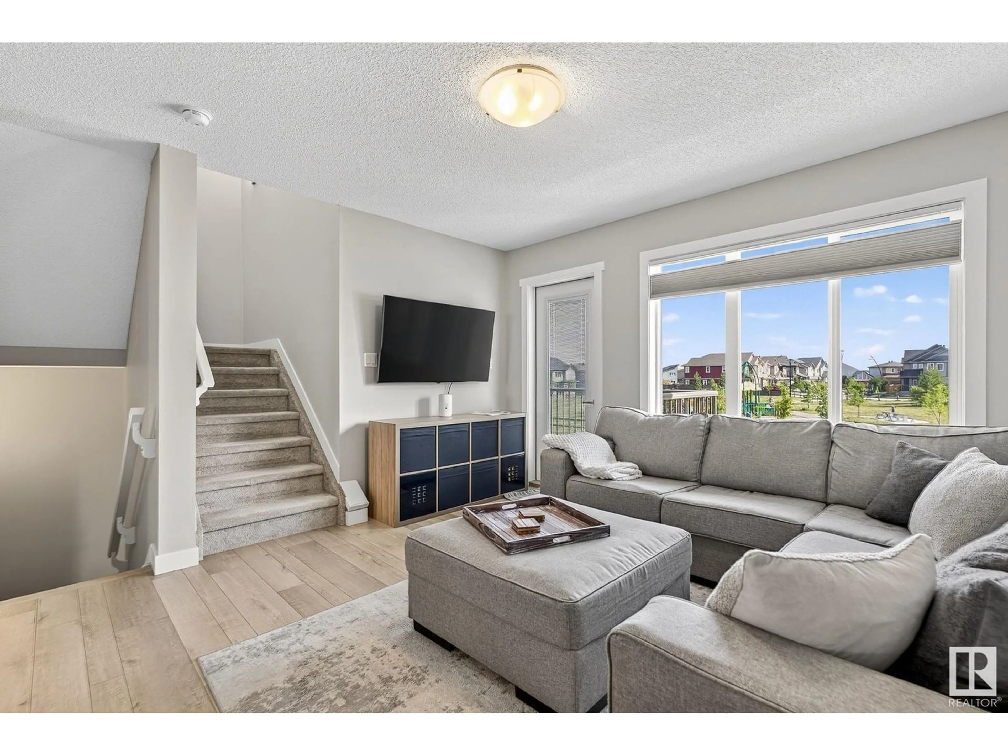 Living room with furniture, unknown for 19604 27 AV, Edmonton Alberta T6M0X2