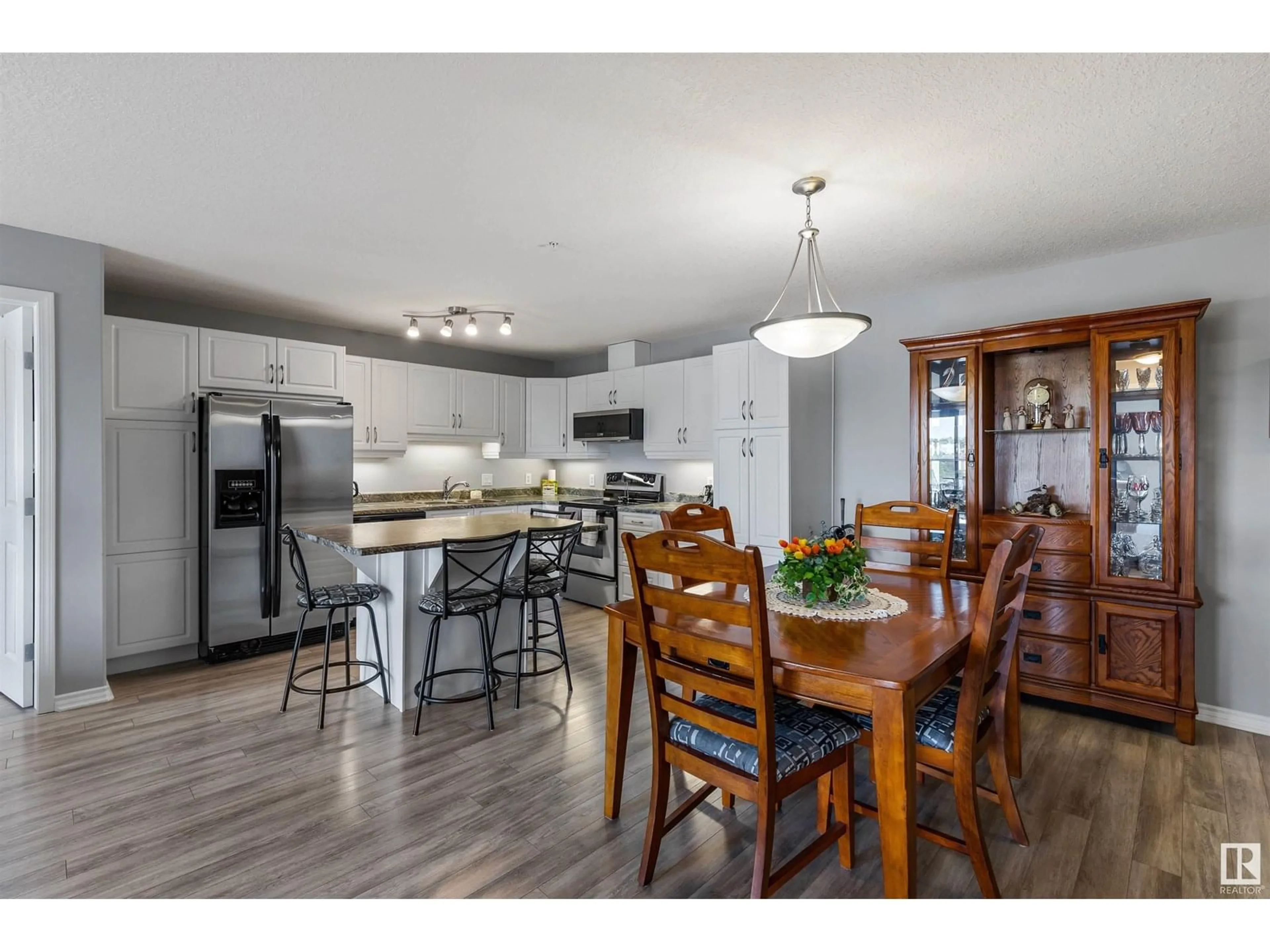 Open concept kitchen, wood/laminate floor for 78B - 444 MCKENNEY AV, St. Albert Alberta T8N7K3