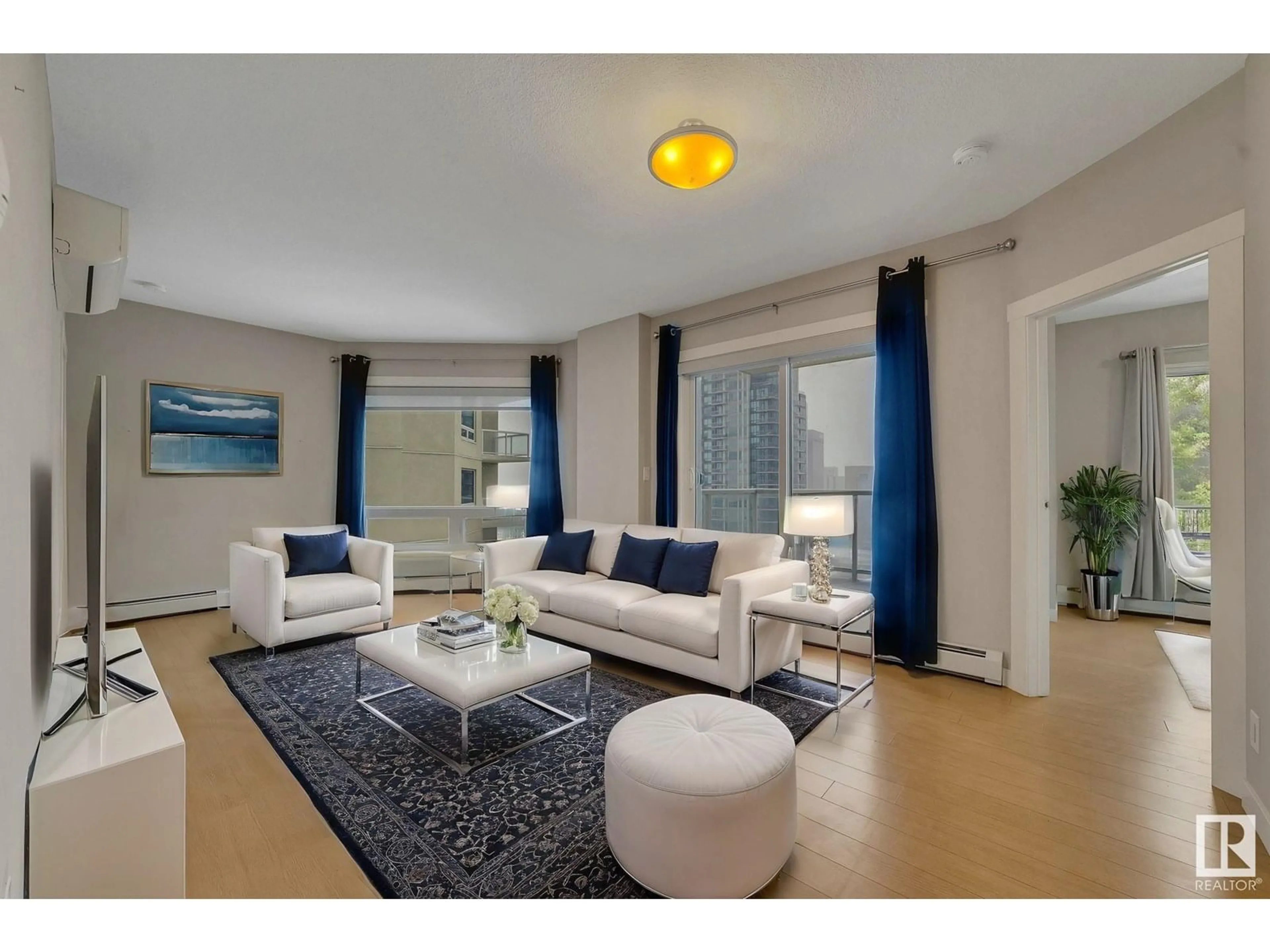 Living room with furniture, unknown for 2107 10410 102 AV NW, Edmonton Alberta T5J0E9
