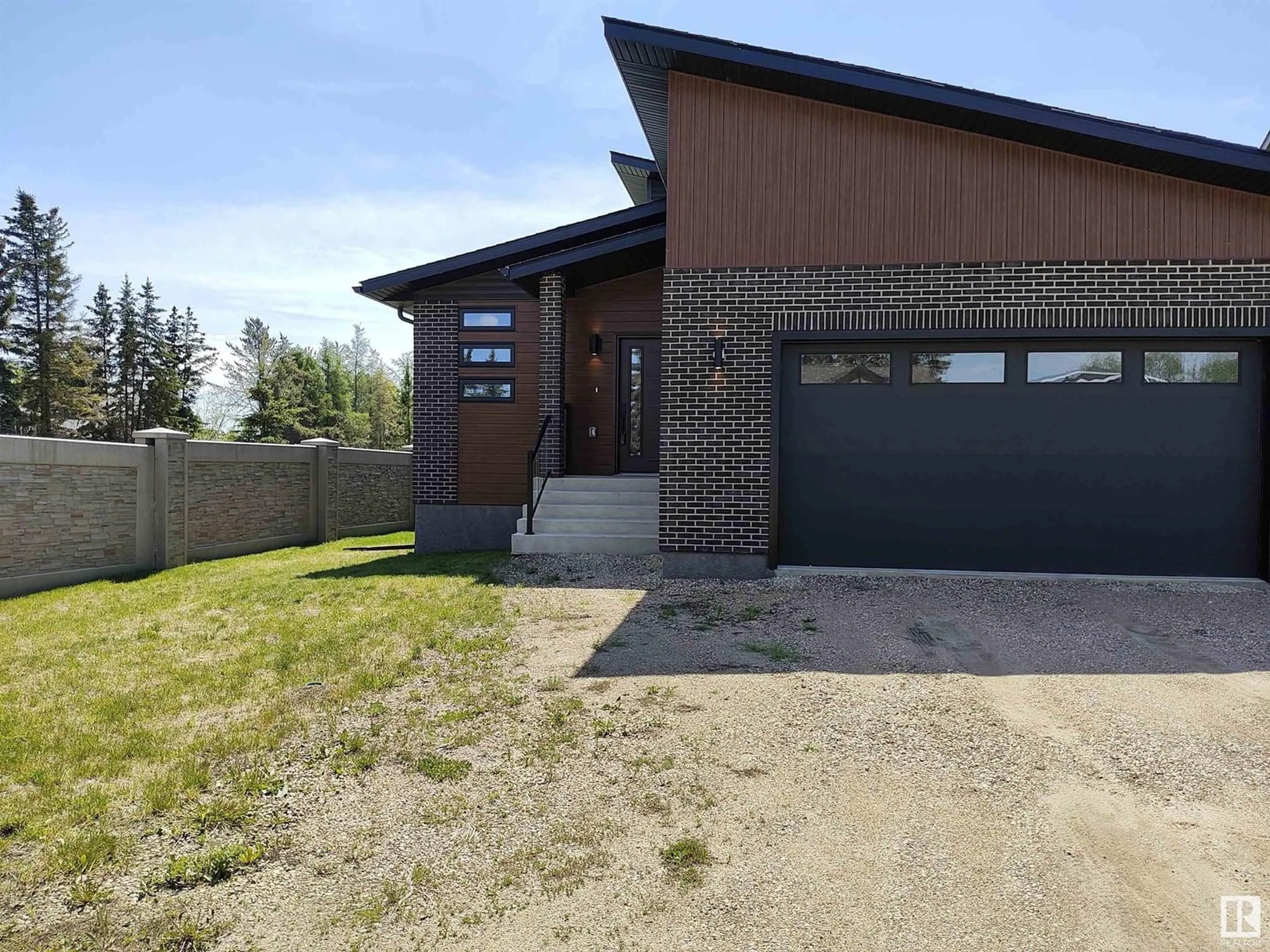Home with brick exterior material, street for 5701 53 AV, St. Paul Town Alberta T0A3A1