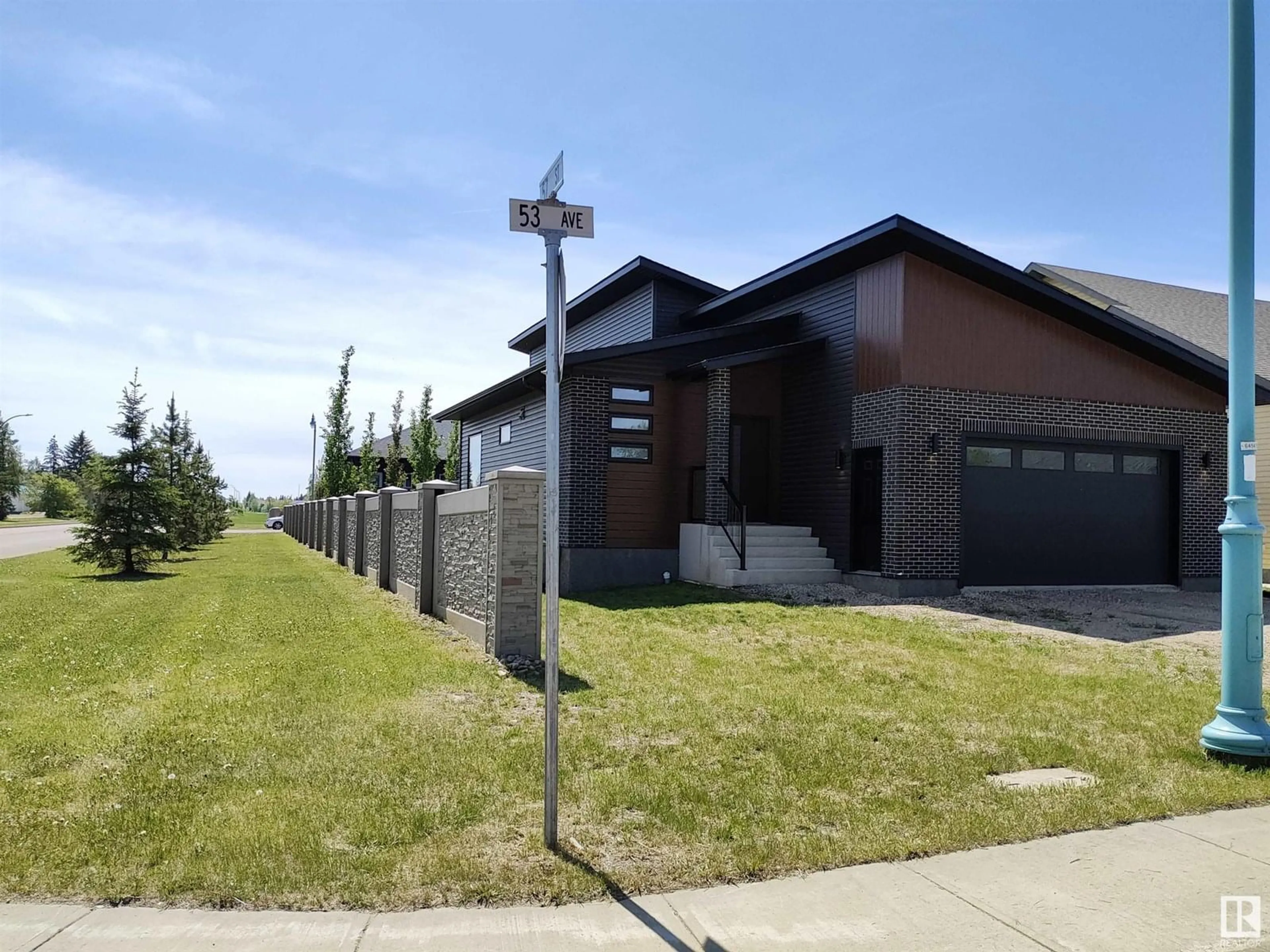 Home with brick exterior material, street for 5701 53 AV, St. Paul Town Alberta T0A3A1