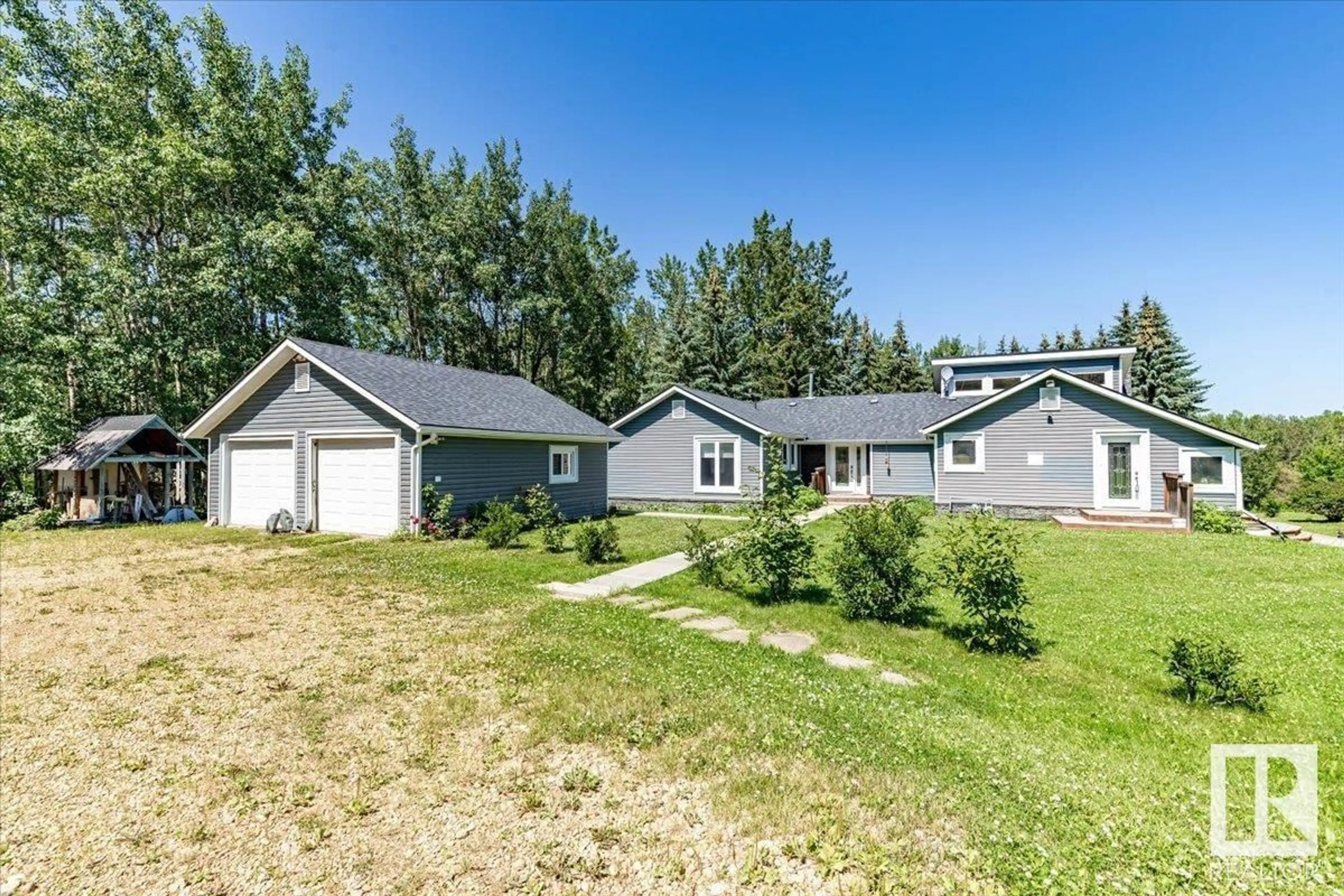 A pic from outside/outdoor area/front of a property/back of a property/a pic from drone, unknown for 8 - 465070 RGE ROAD 20, Rural Wetaskiwin County Alberta T9A1V5