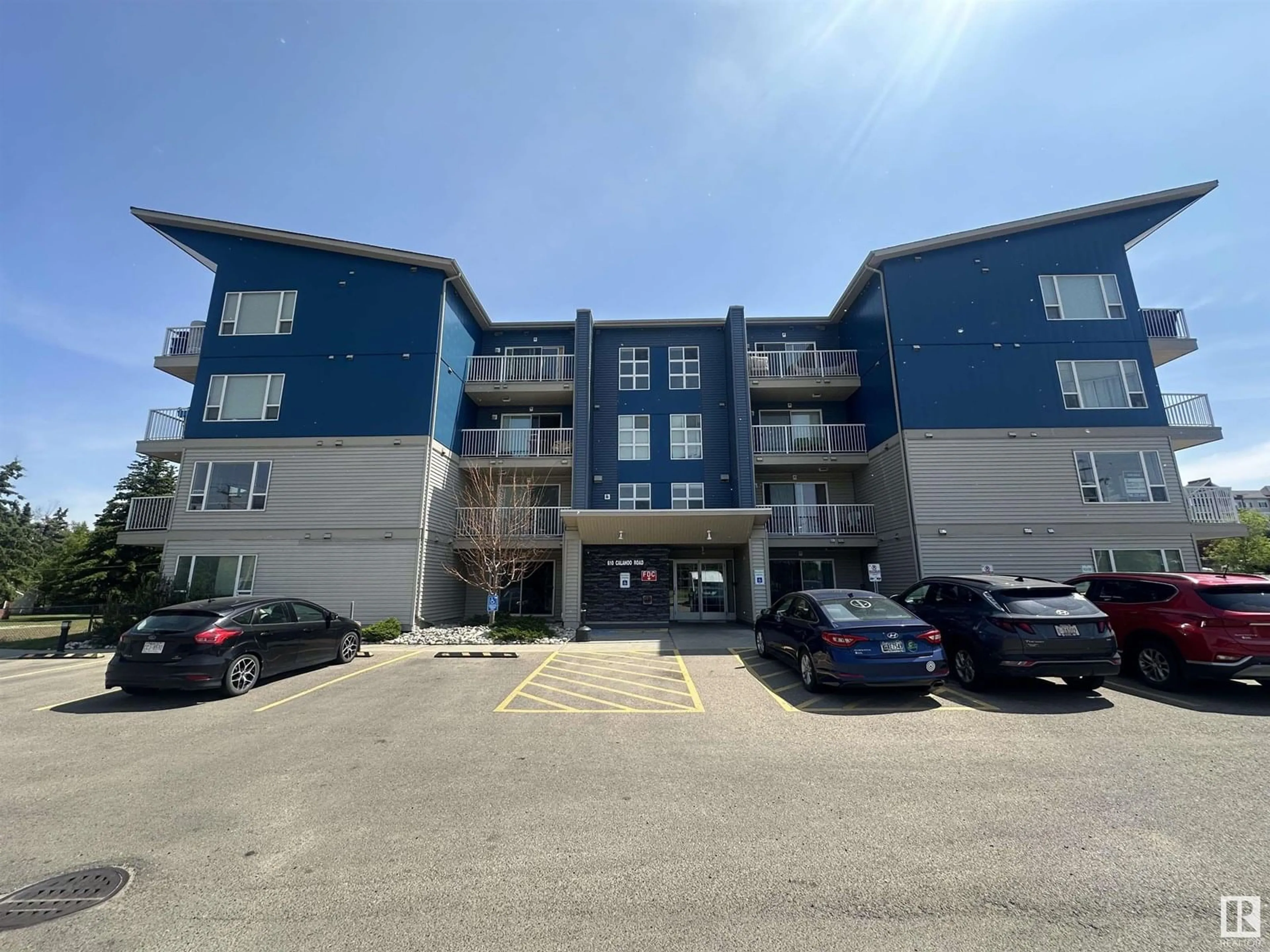 A pic from outside/outdoor area/front of a property/back of a property/a pic from drone, building for #103 - 610 CALAHOO RD, Spruce Grove Alberta T7X1R1