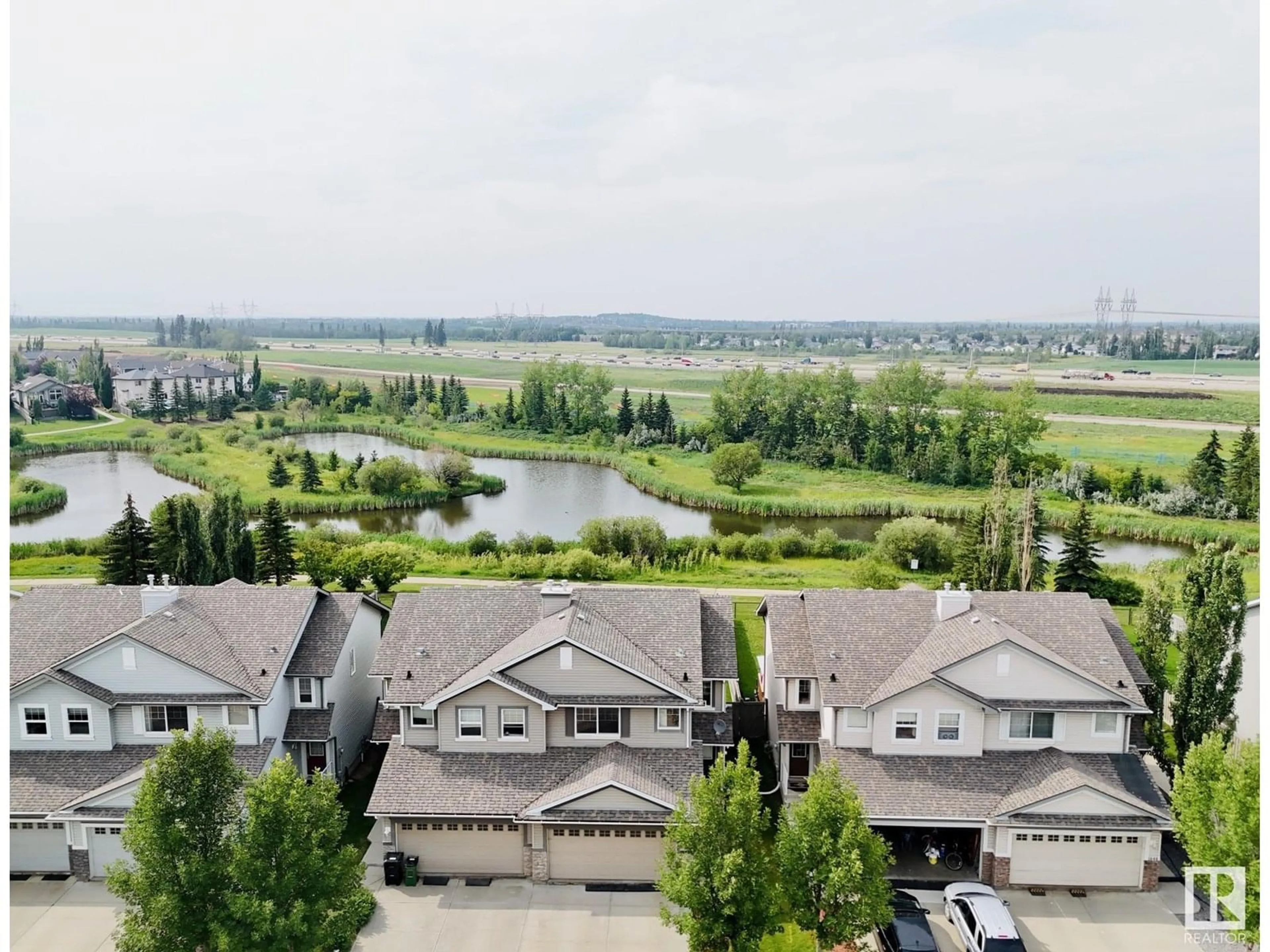 A pic from outside/outdoor area/front of a property/back of a property/a pic from drone, water/lake/river/ocean view for 1644 MELROSE PL, Edmonton Alberta T6W1X5