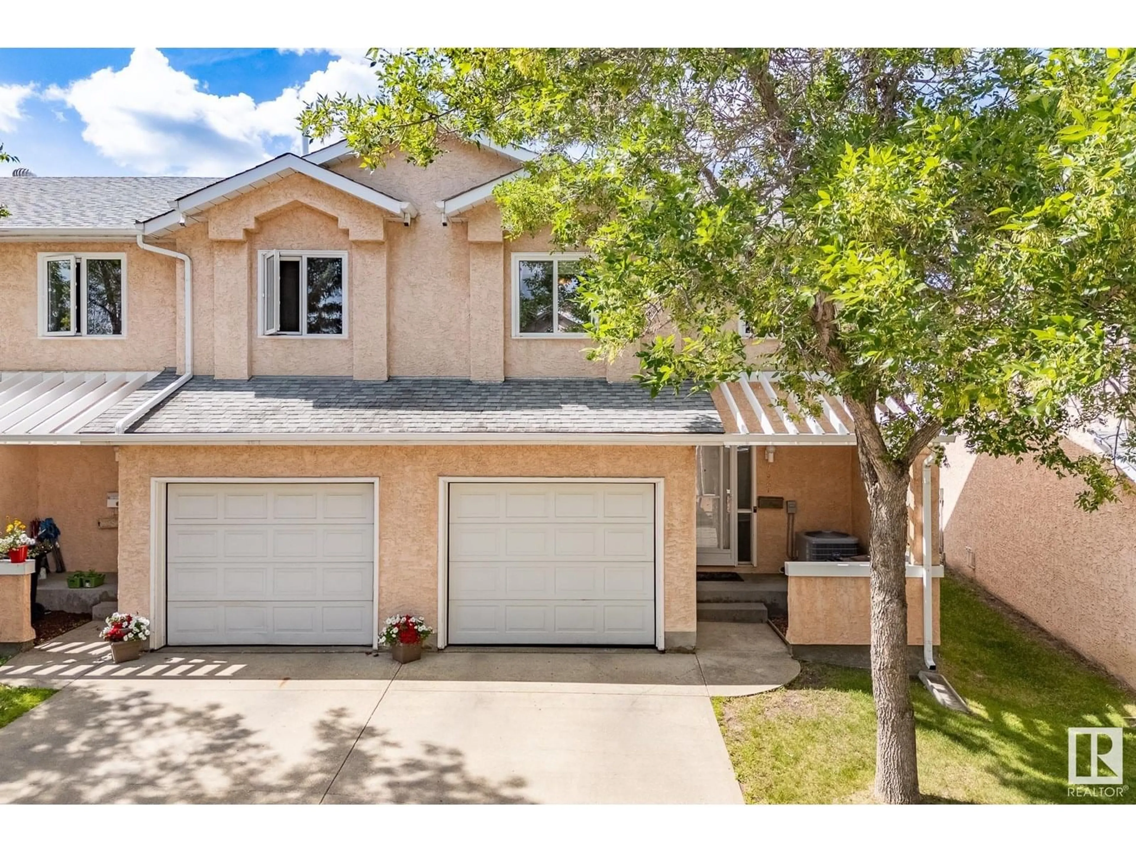 Home with vinyl exterior material, street for NW - 7527 188 ST, Edmonton Alberta T5T5W9