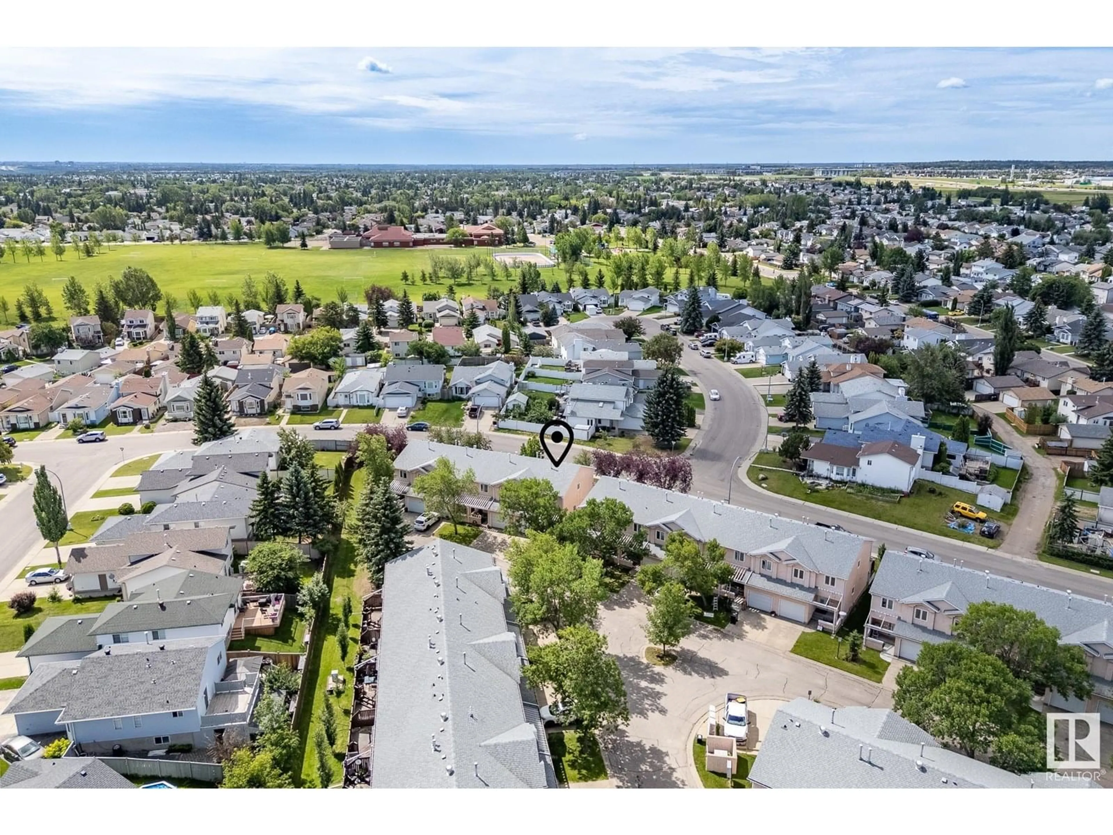 A pic from outside/outdoor area/front of a property/back of a property/a pic from drone, street for NW - 7527 188 ST, Edmonton Alberta T5T5W9
