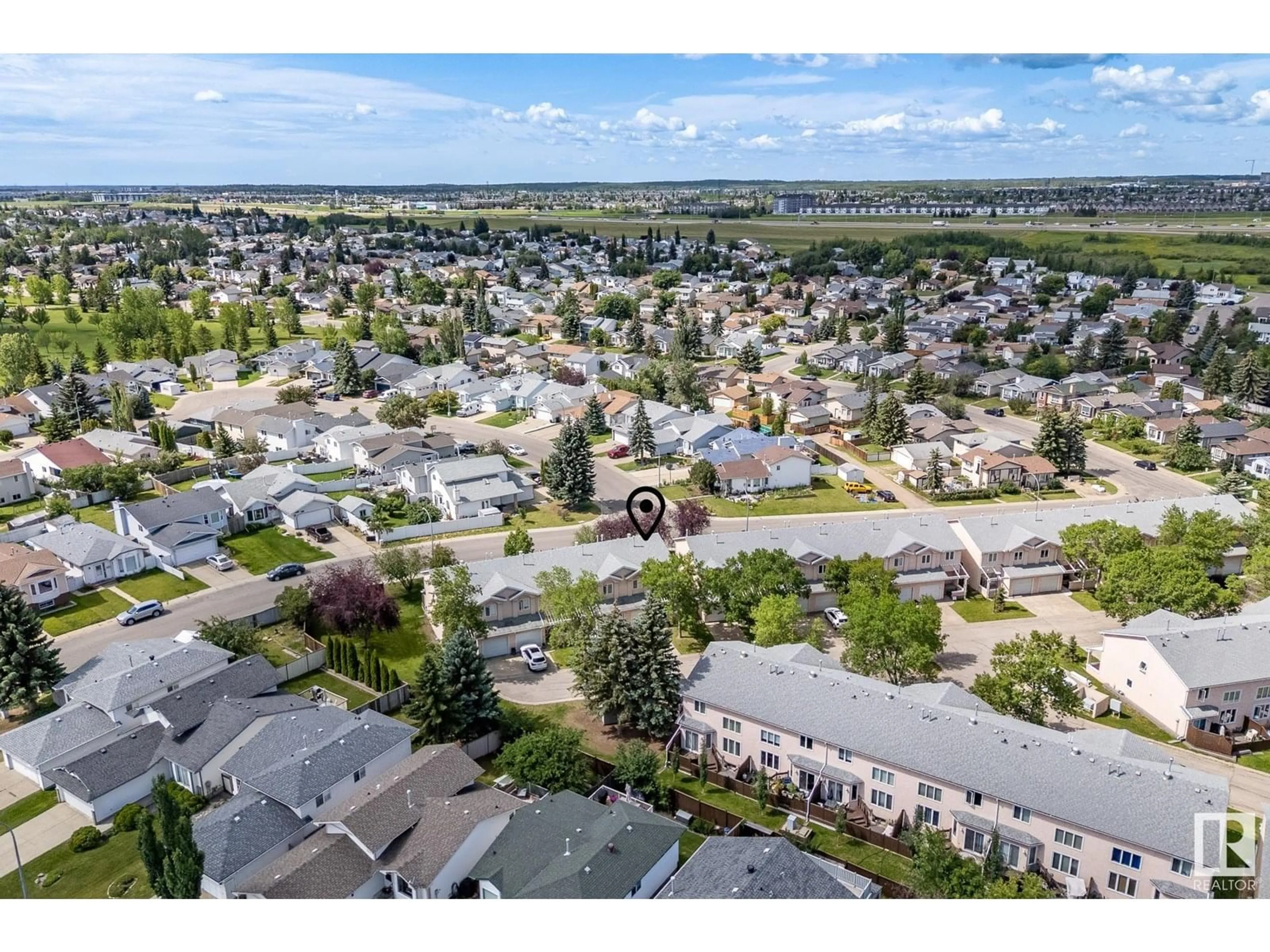 A pic from outside/outdoor area/front of a property/back of a property/a pic from drone, unknown for NW - 7527 188 ST, Edmonton Alberta T5T5W9