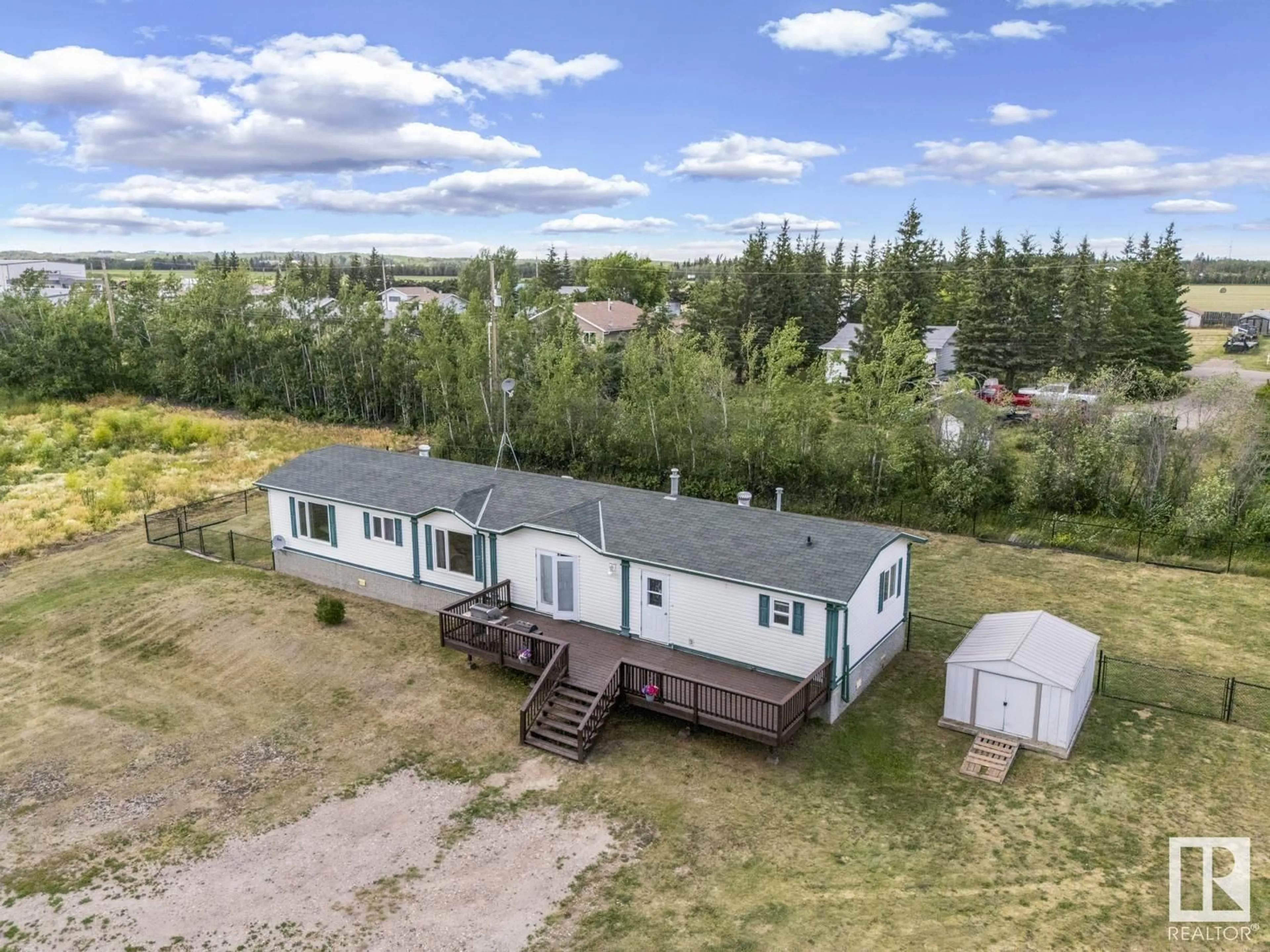 A pic from outside/outdoor area/front of a property/back of a property/a pic from drone, building for 4709 51 AV, La Corey Alberta T0A2E0