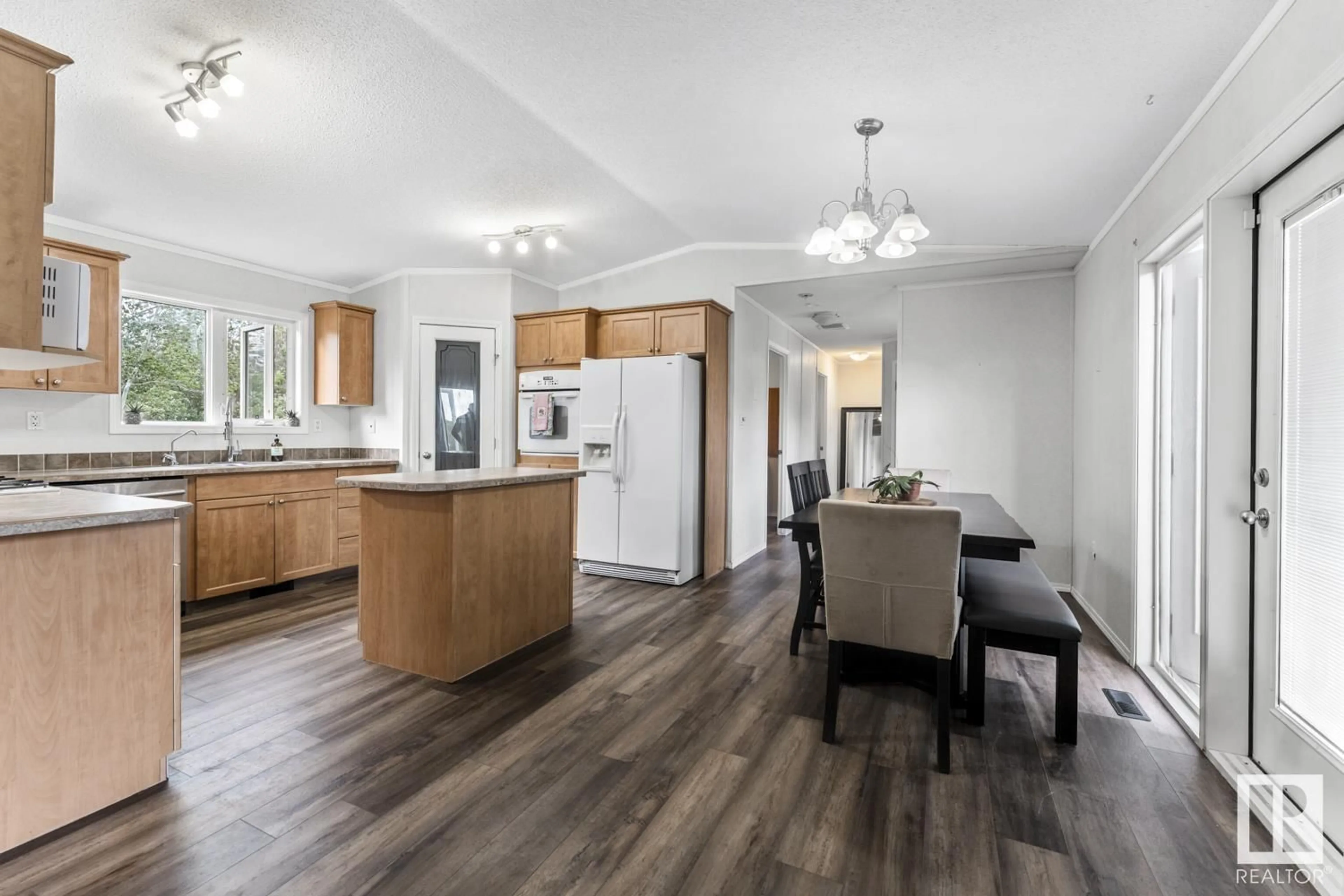 Open concept kitchen, wood/laminate floor for 4709 51 AV, La Corey Alberta T0A2E0