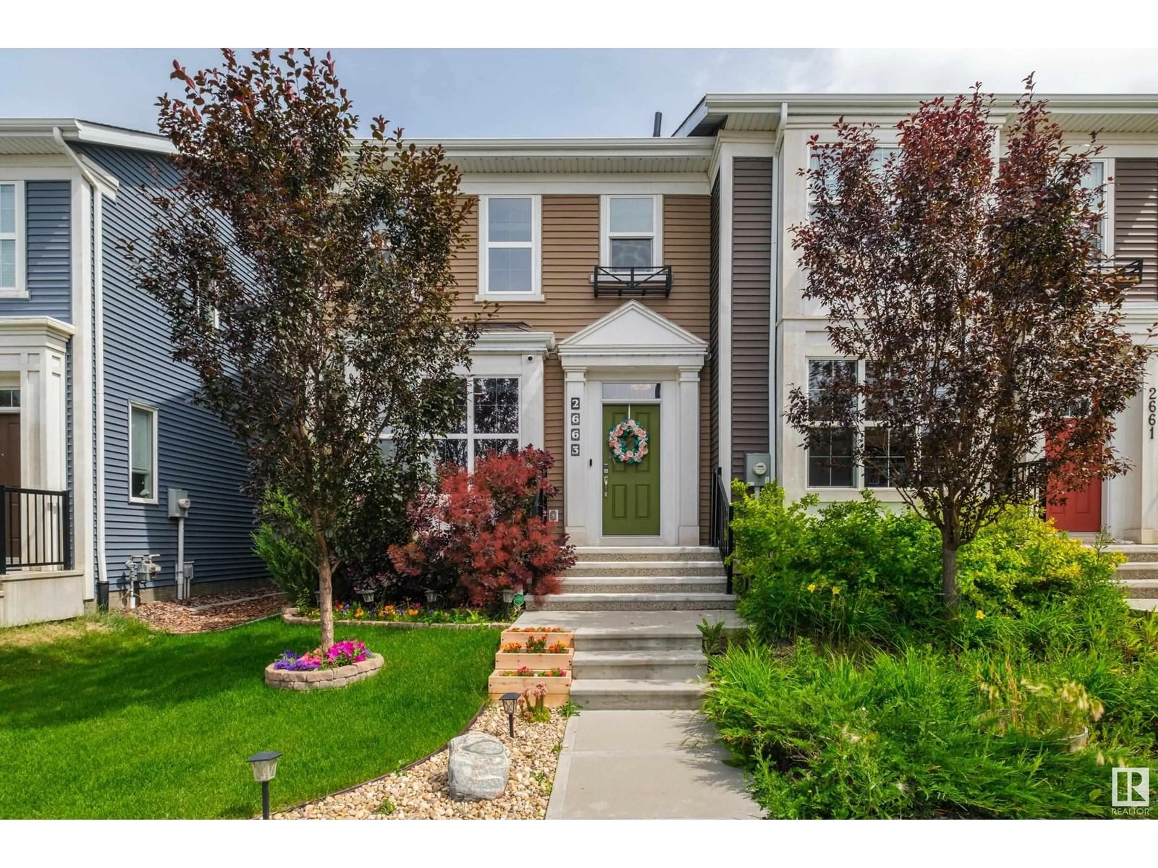 Home with vinyl exterior material, street for 2663 MAPLE WY, Edmonton Alberta T6T2E9