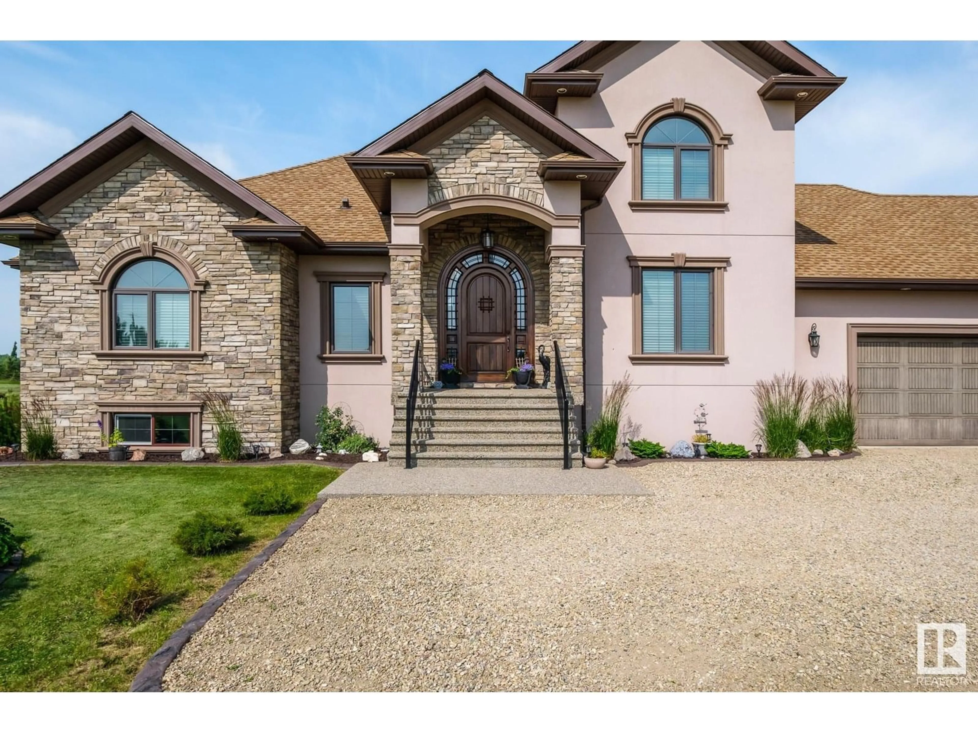 Home with brick exterior material, street for 1030 - 50125 RGE ROAD 233, Rural Leduc County Alberta T4X0L2