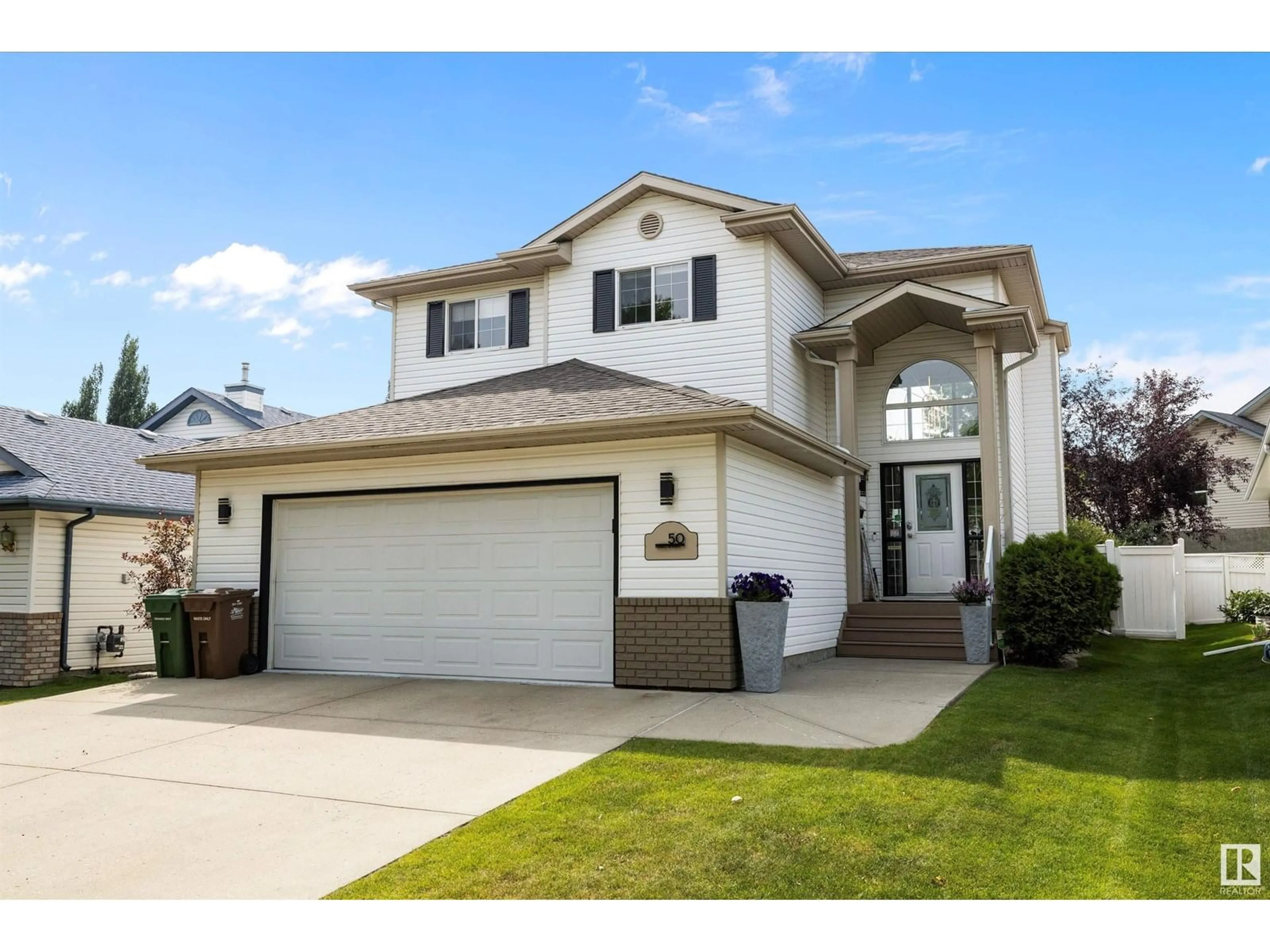 Home with vinyl exterior material, street for 50 OAKRIDGE DR, St. Albert Alberta T8N6P4