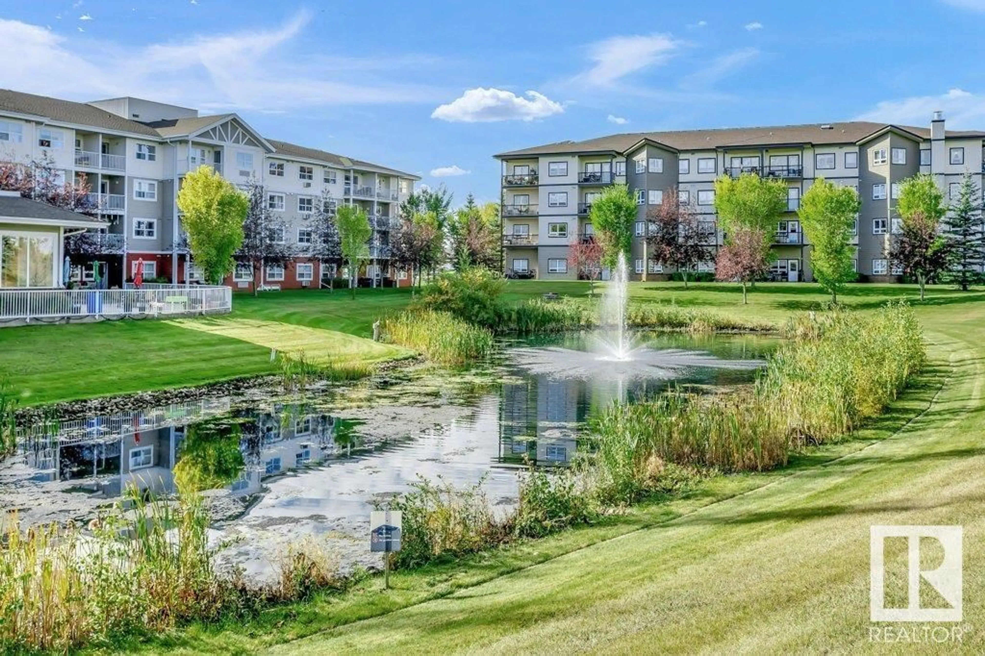 A pic from outside/outdoor area/front of a property/back of a property/a pic from drone, water/lake/river/ocean view for 220 8802 SOUTHFORT, Fort Saskatchewan Alberta T8L4R6