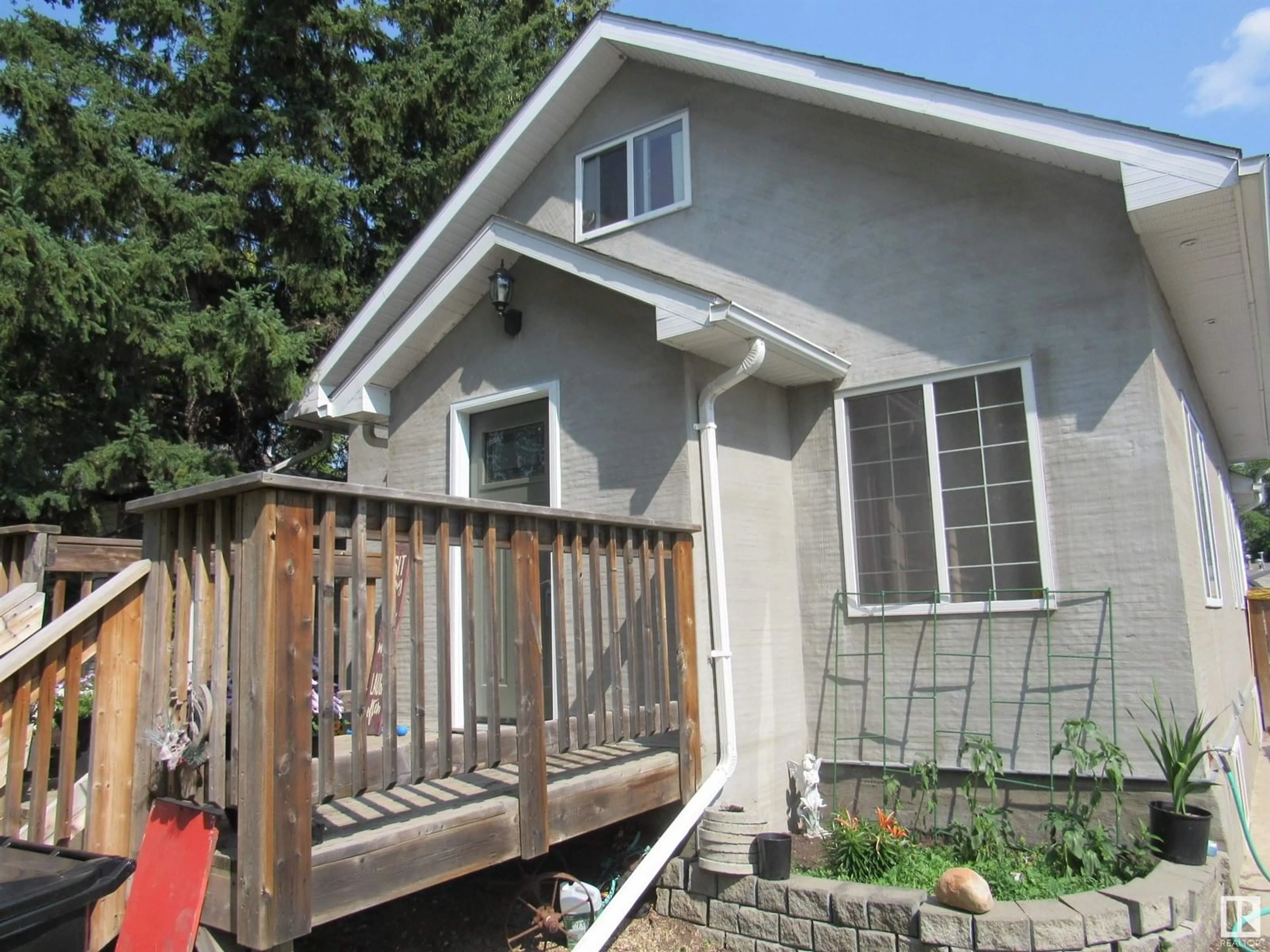 Home with vinyl exterior material, street for 5011 53 STREET, Barrhead Alberta T7N1E8