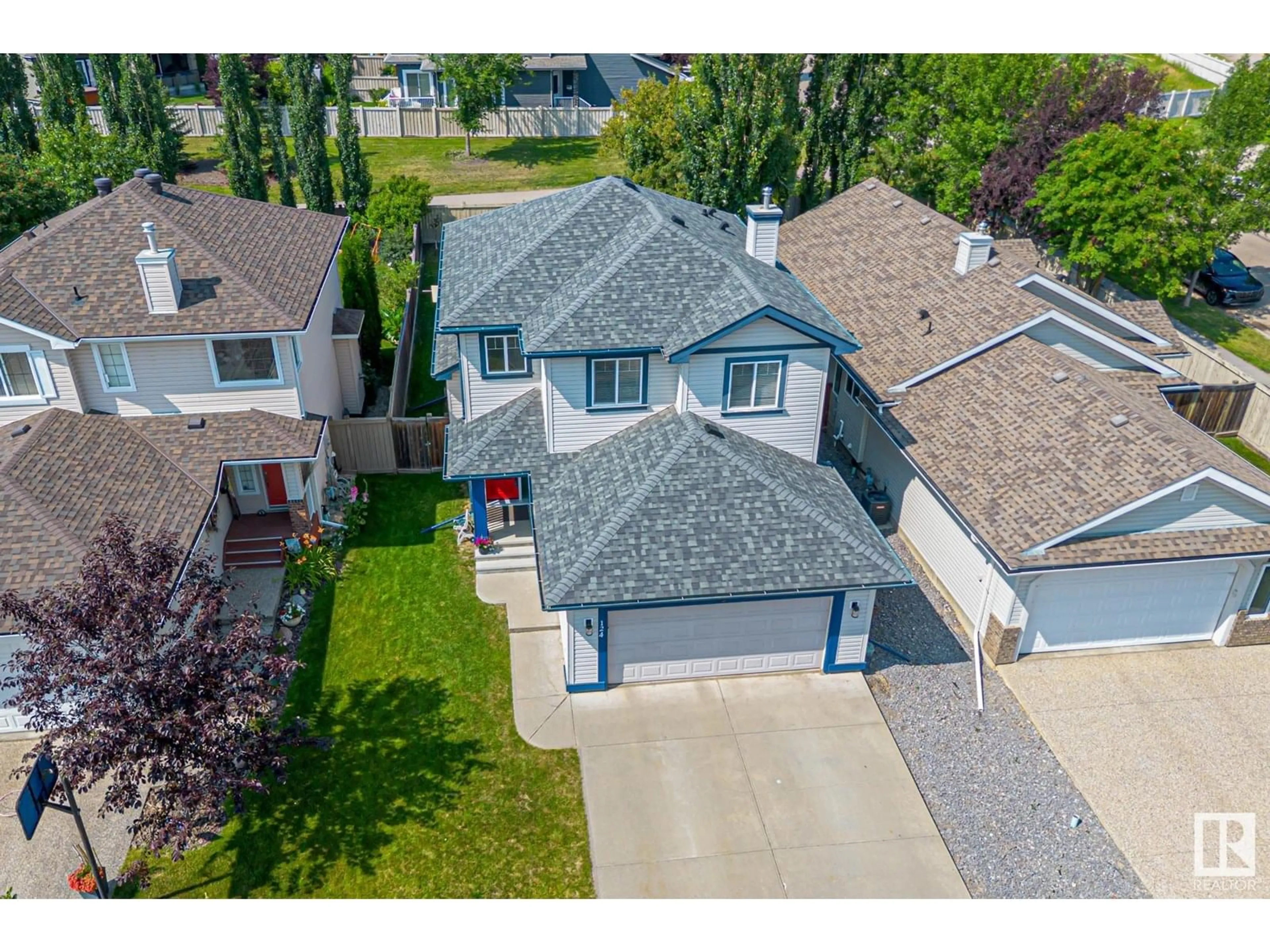 A pic from outside/outdoor area/front of a property/back of a property/a pic from drone, street for 124 EASTGATE WY, St. Albert Alberta T8N7K2