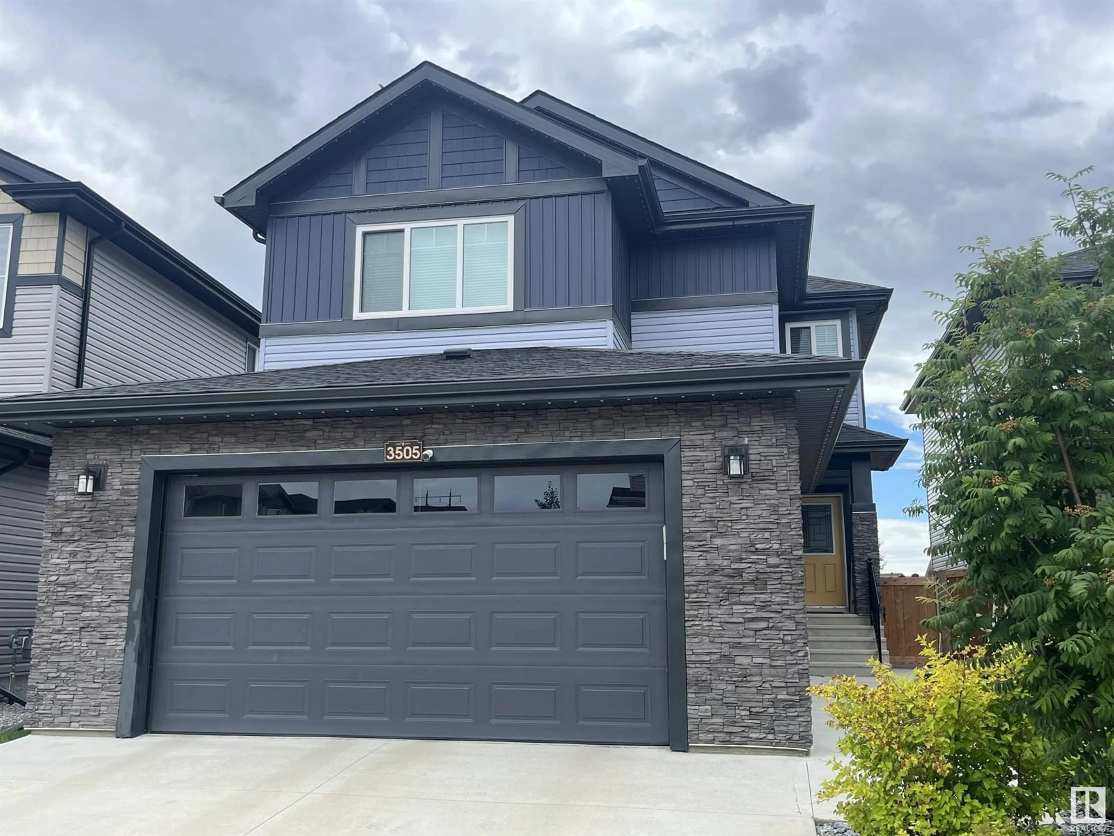 Home with vinyl exterior material, street for 3505 46 AV, Beaumont Alberta T4X2Y4