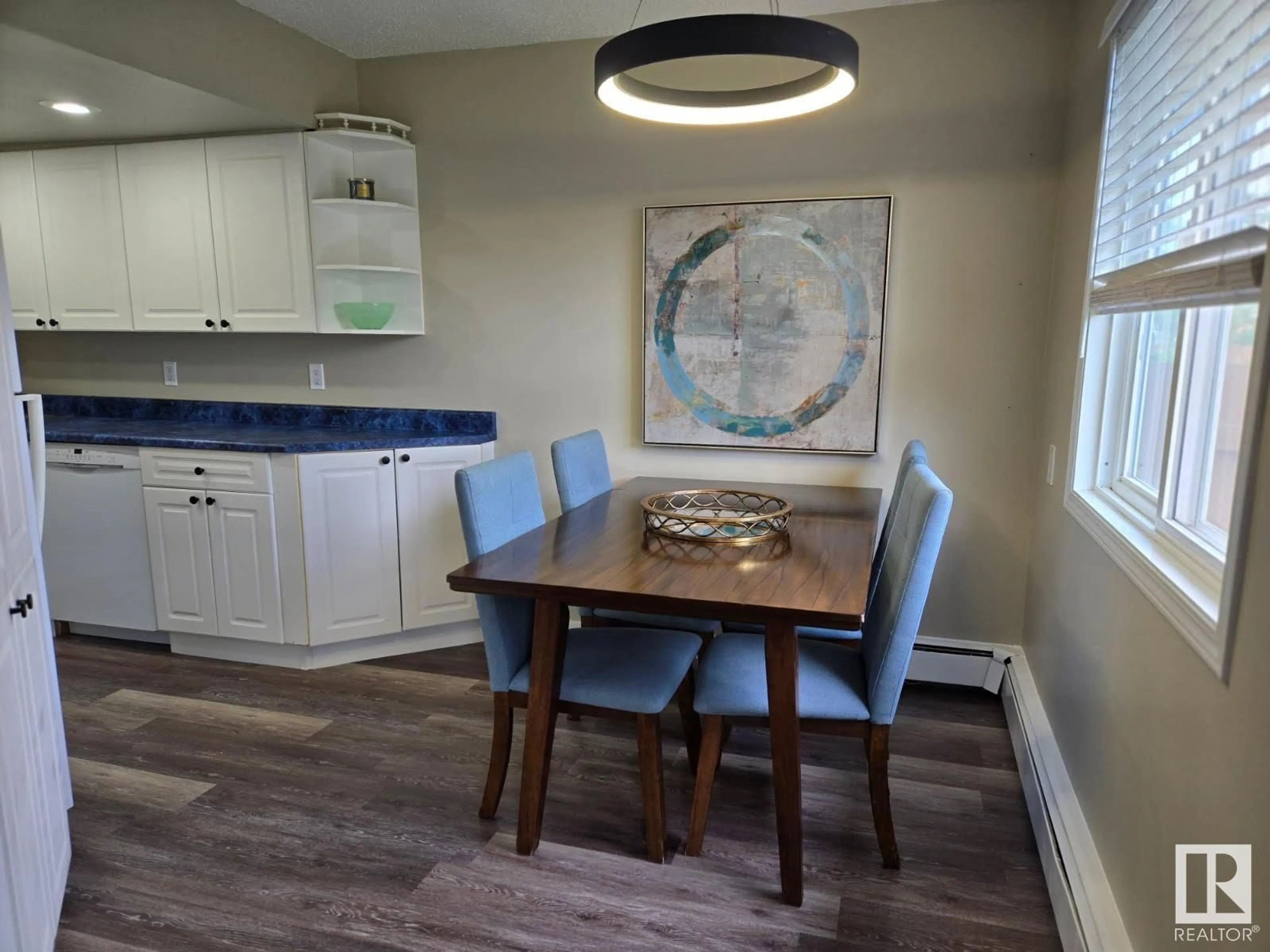 Dining room, wood/laminate floor for 9 - 18305 89 AV NW, Edmonton Alberta T6T1X2