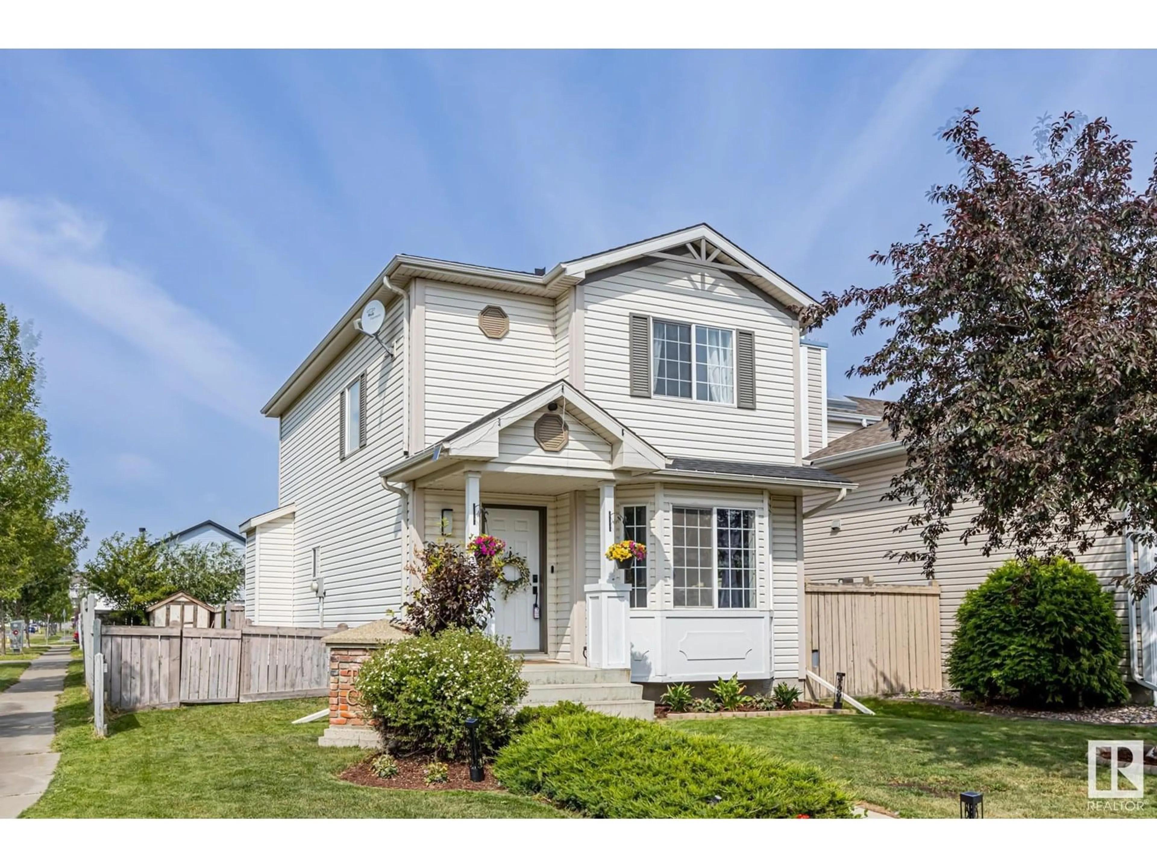 Home with vinyl exterior material, street for NW - 15006 135A ST, Edmonton Alberta T6V1N1