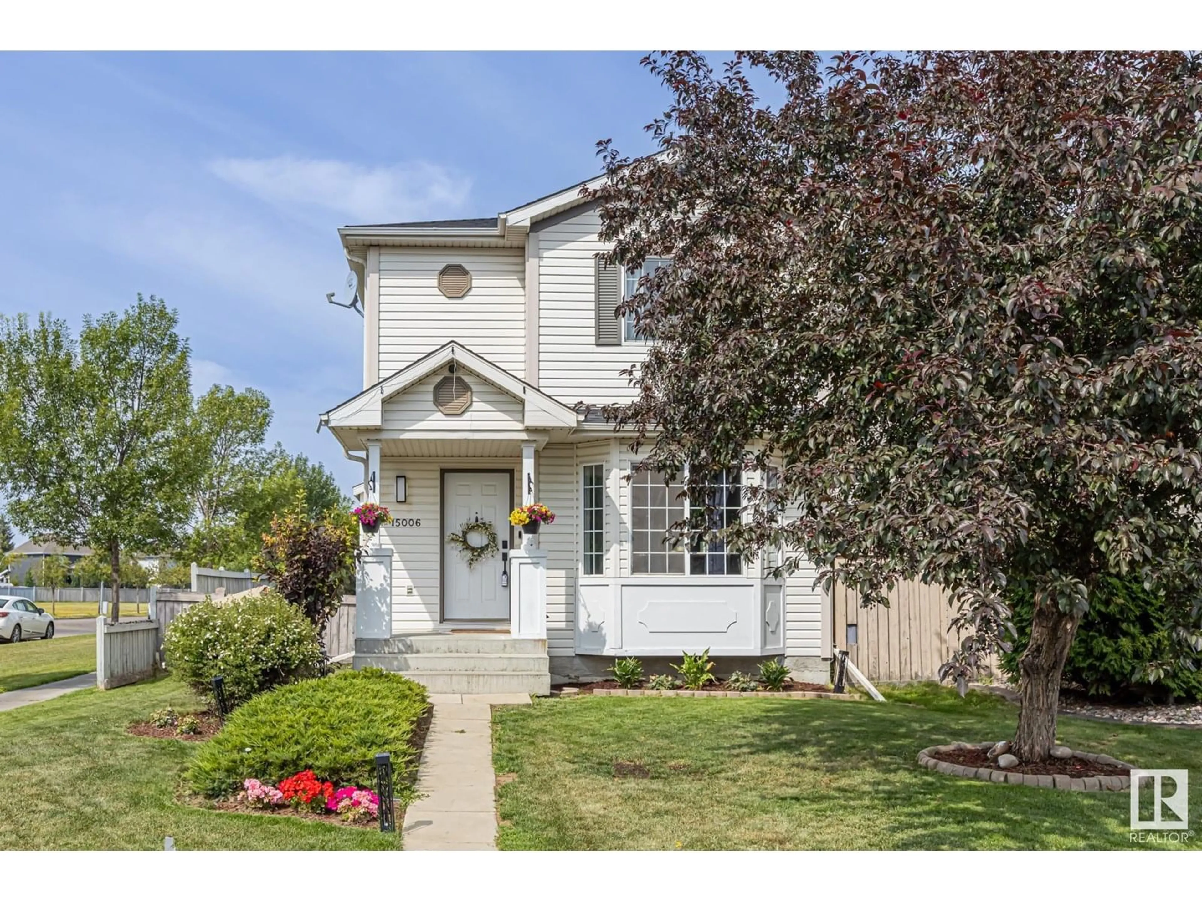 Home with vinyl exterior material, street for NW - 15006 135A ST, Edmonton Alberta T6V1N1
