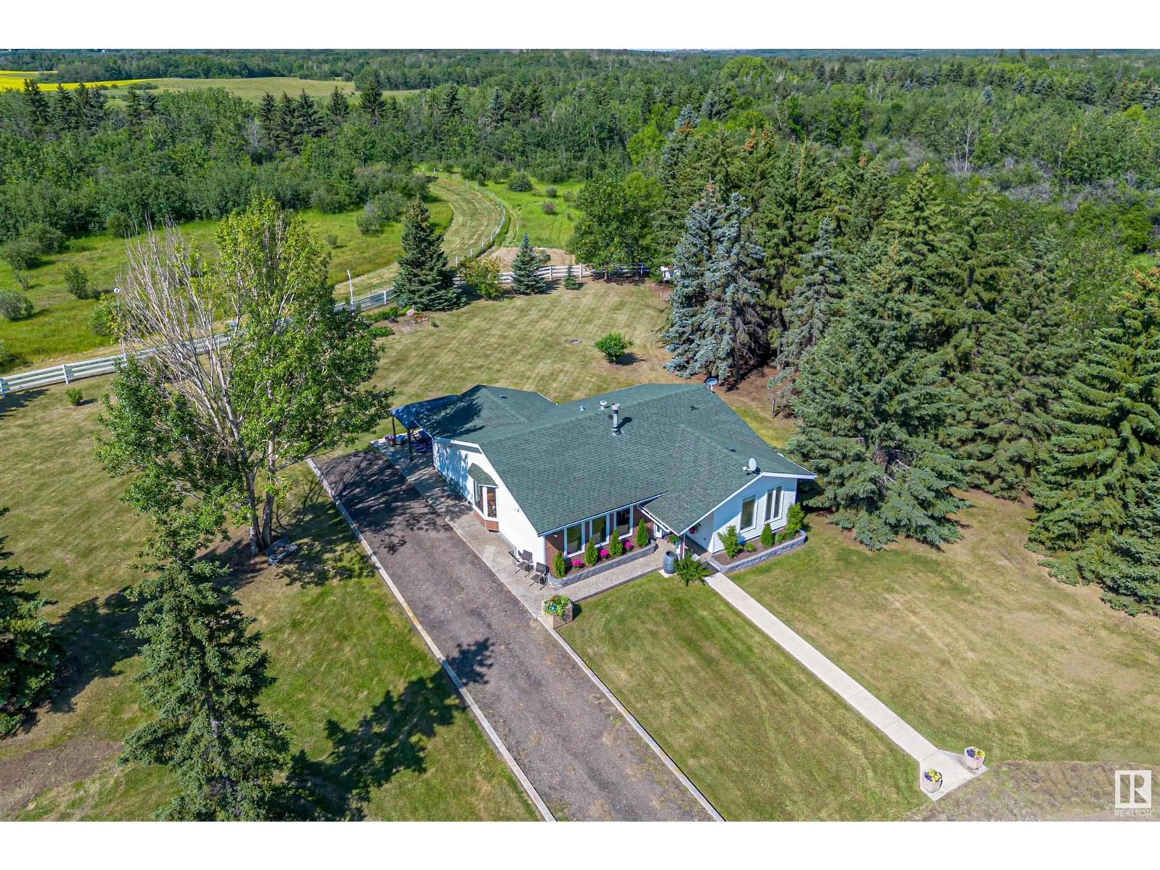 A pic from outside/outdoor area/front of a property/back of a property/a pic from drone, unknown for 21341 TWP ROAD 534, Rural Strathcona County Alberta T8G2B2