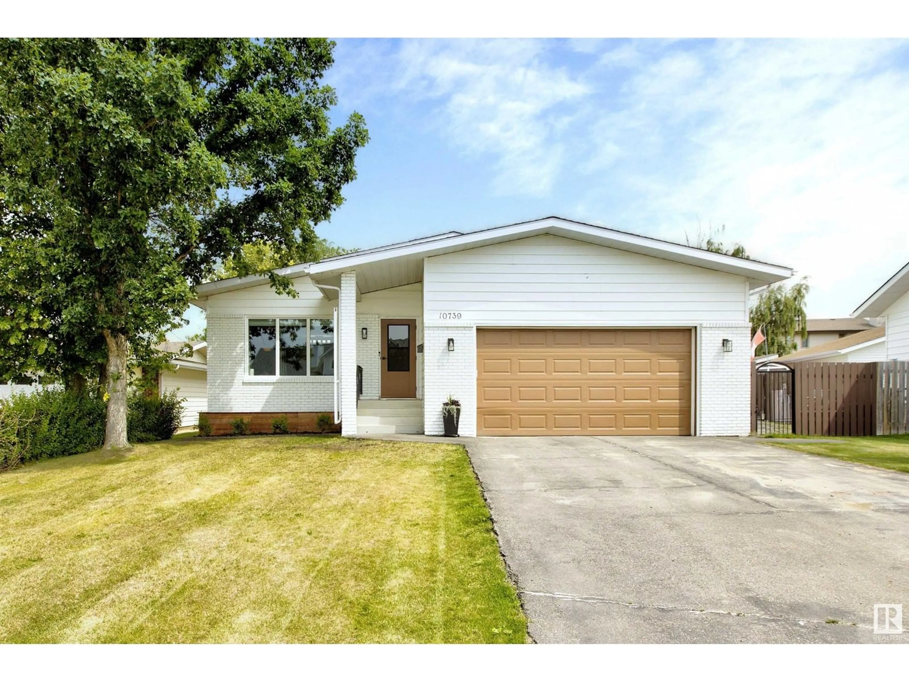 Home with vinyl exterior material, street for 10739 108 AV, Westlock Alberta T7P1C7