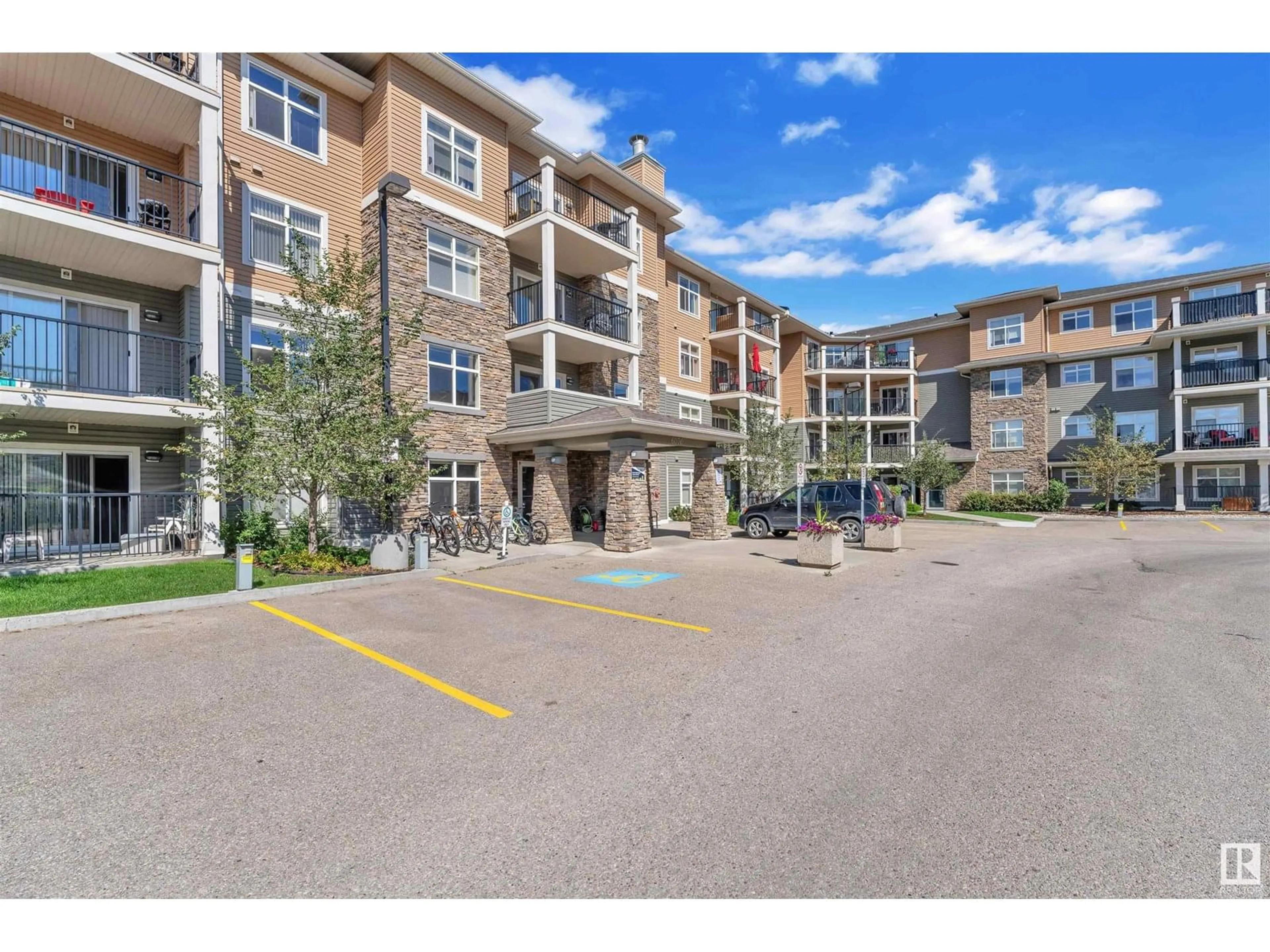 A pic from outside/outdoor area/front of a property/back of a property/a pic from drone, unknown for 228 - 6076 SCHONSEE WY, Edmonton Alberta T5Z0K8