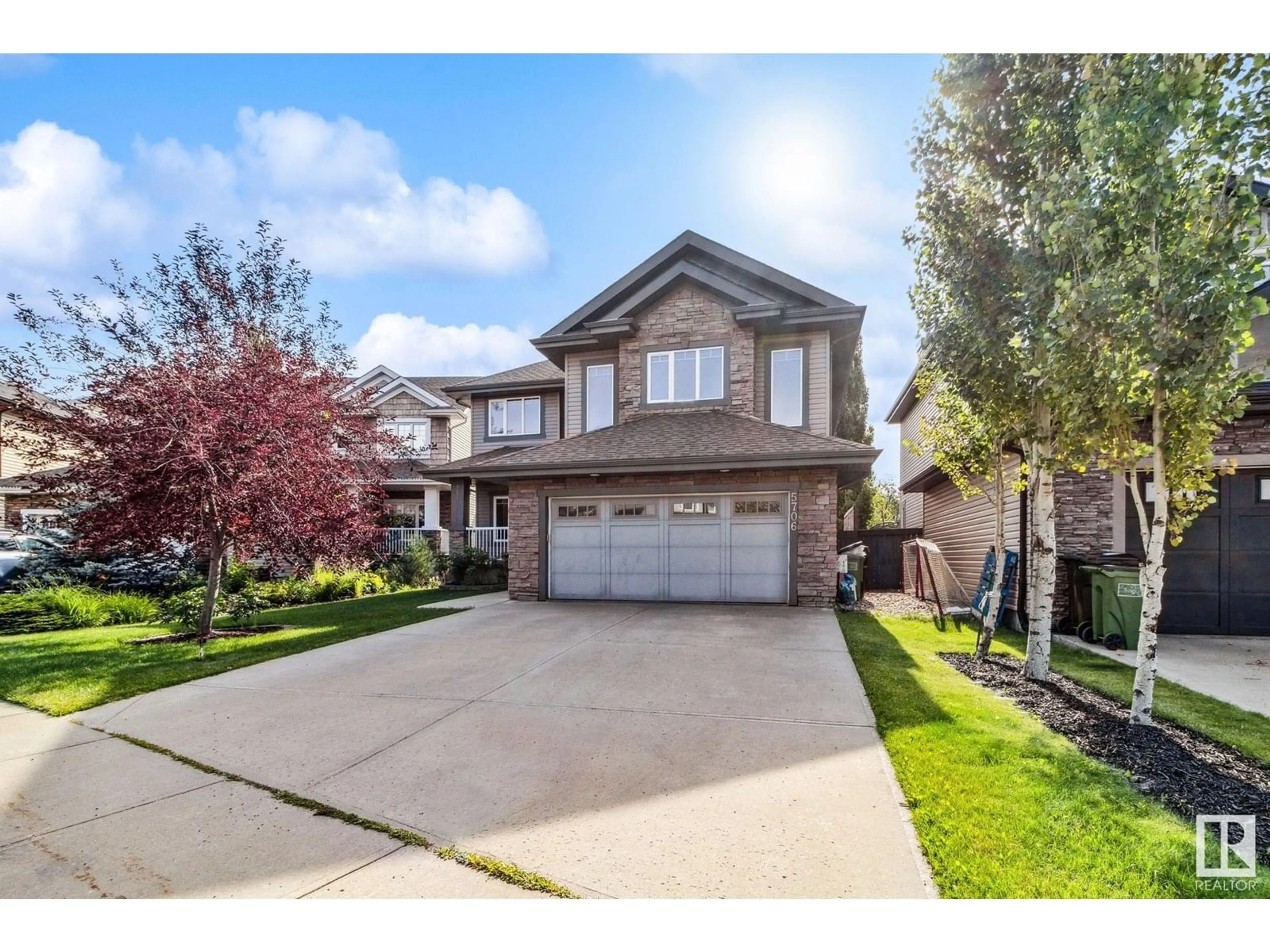 Home with vinyl exterior material, street for 5706 MCLUHAN BAY, Edmonton Alberta T6R0P8