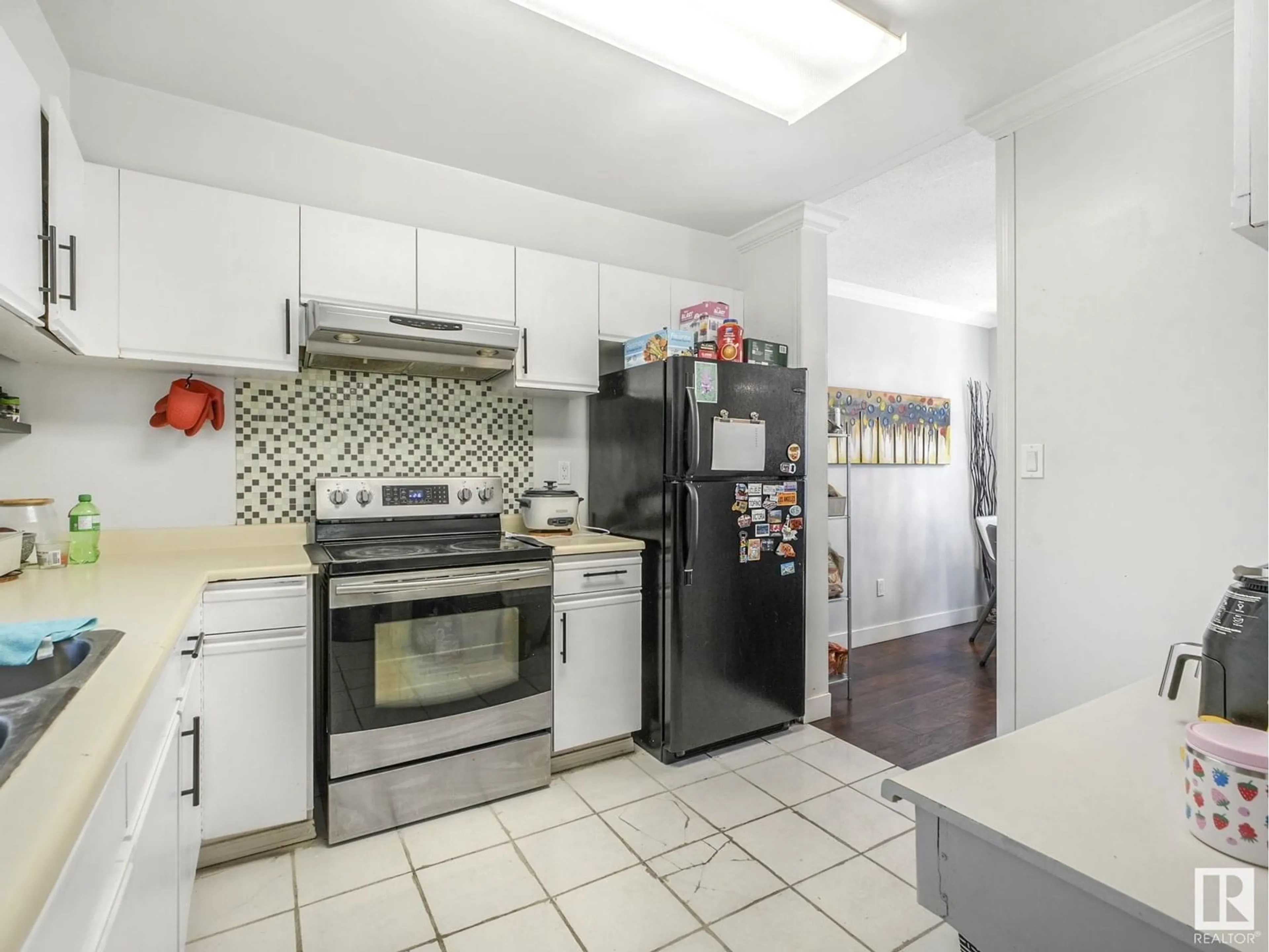 Standard kitchen, ceramic/tile floor for 17010 100 ST, Edmonton Alberta T5X5E1