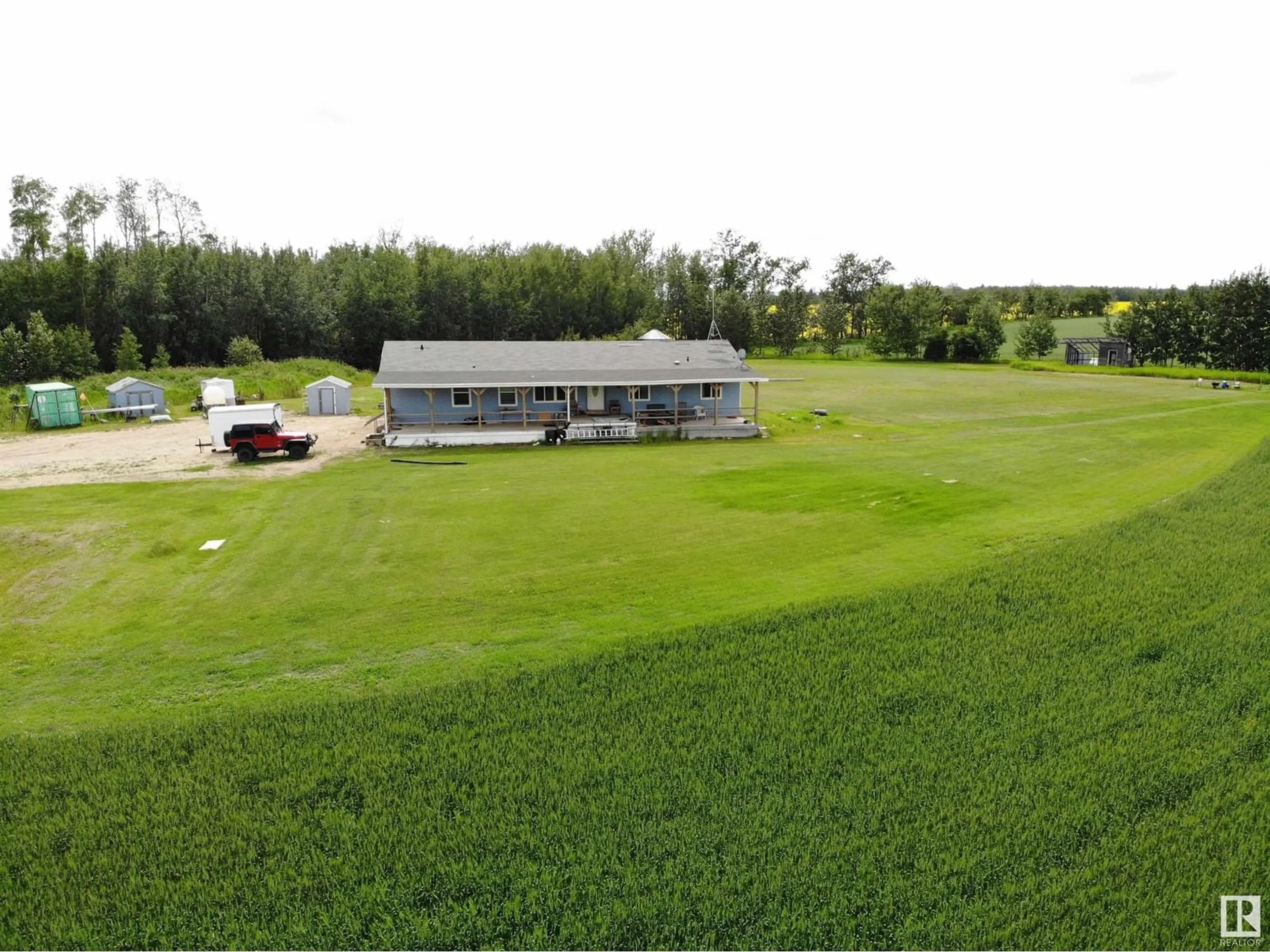 A pic from outside/outdoor area/front of a property/back of a property/a pic from drone, building for 27011 TWP RD 580, Rural Westlock County Alberta T0G0A6