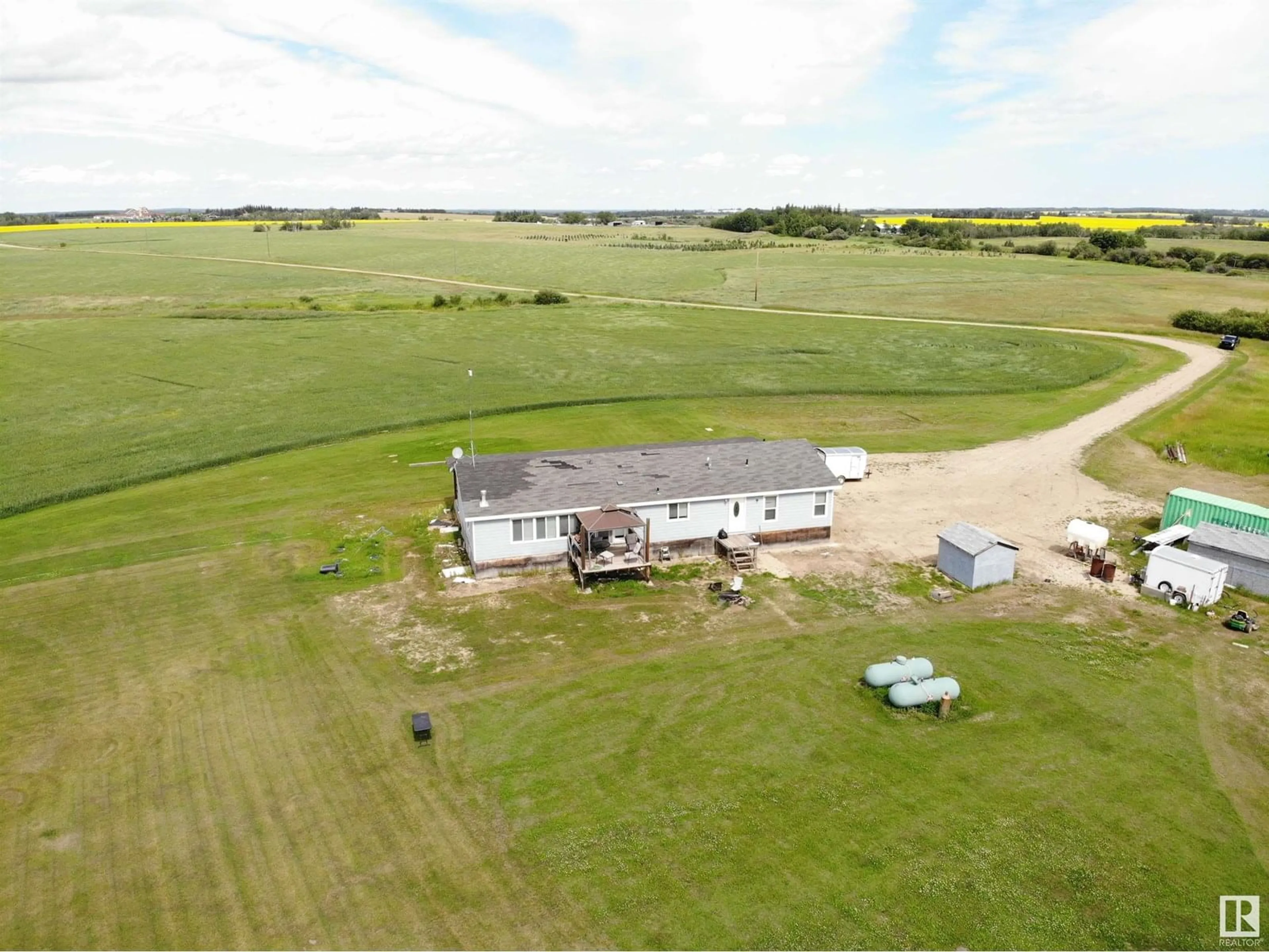 A pic from outside/outdoor area/front of a property/back of a property/a pic from drone, building for 27011 TWP RD 580, Rural Westlock County Alberta T0G0A6