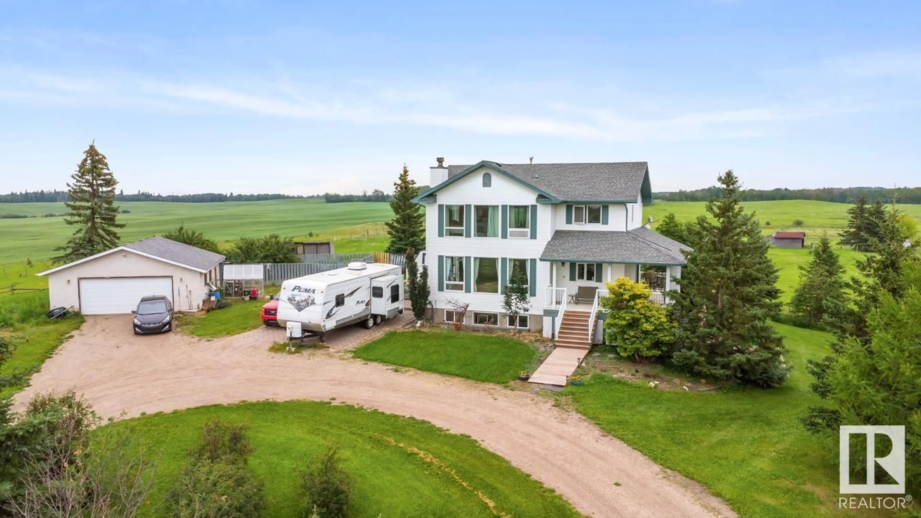 A pic from outside/outdoor area/front of a property/back of a property/a pic from drone, unknown for 51433 RGE ROAD 232, Rural Strathcona County Alberta T8B1L1