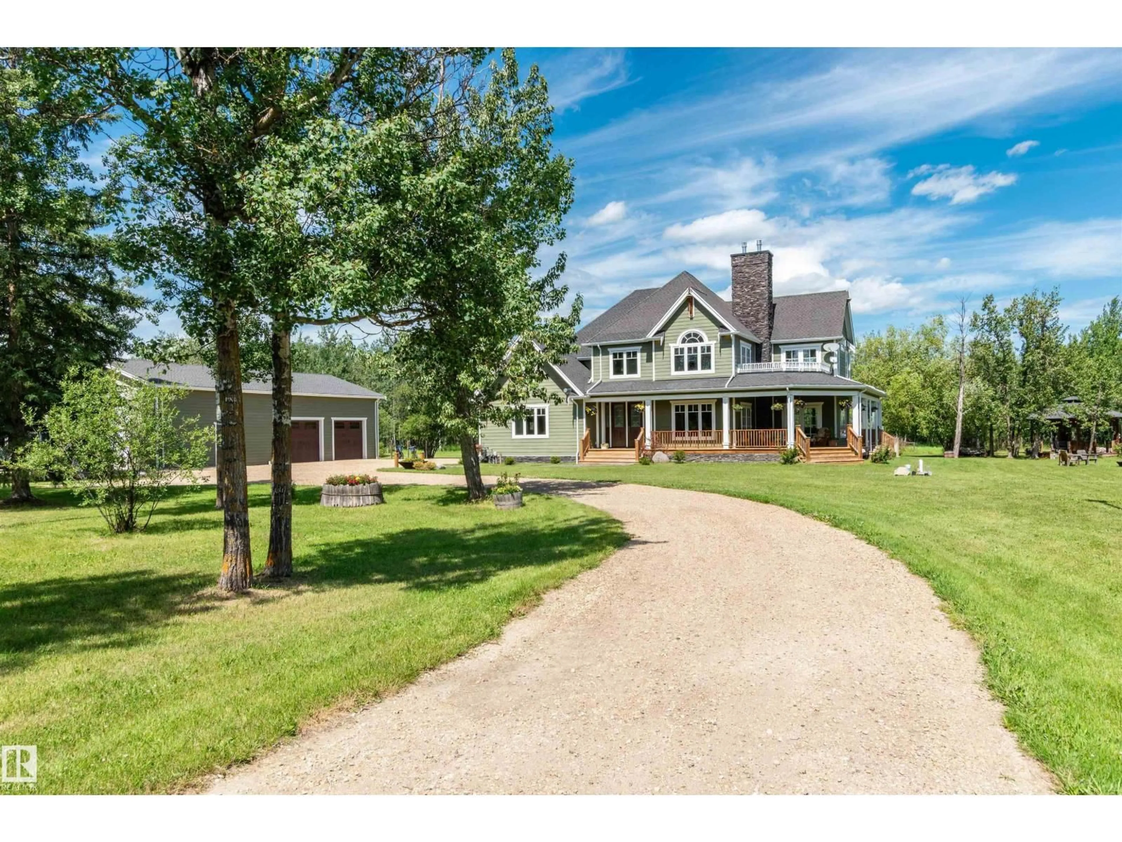 A pic from outside/outdoor area/front of a property/back of a property/a pic from drone, unknown for 51218 - 37 RGE ROAD 214 RGE, Rural Strathcona County Alberta T8E1G9