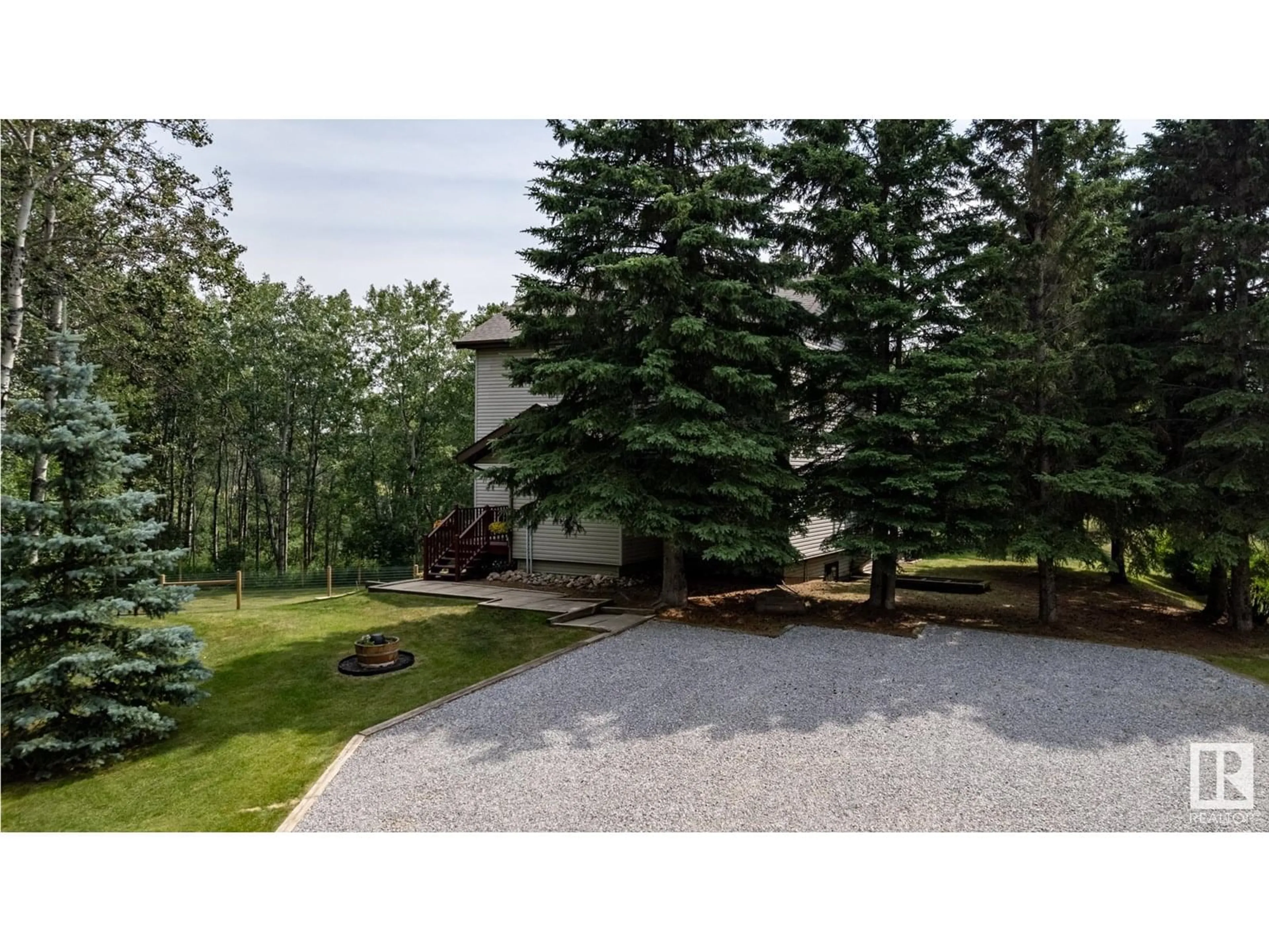 A pic from outside/outdoor area/front of a property/back of a property/a pic from drone, forest/trees view for 52437 - 23 RANGE ROAD 21, Rural Parkland County Alberta T7Y2H1