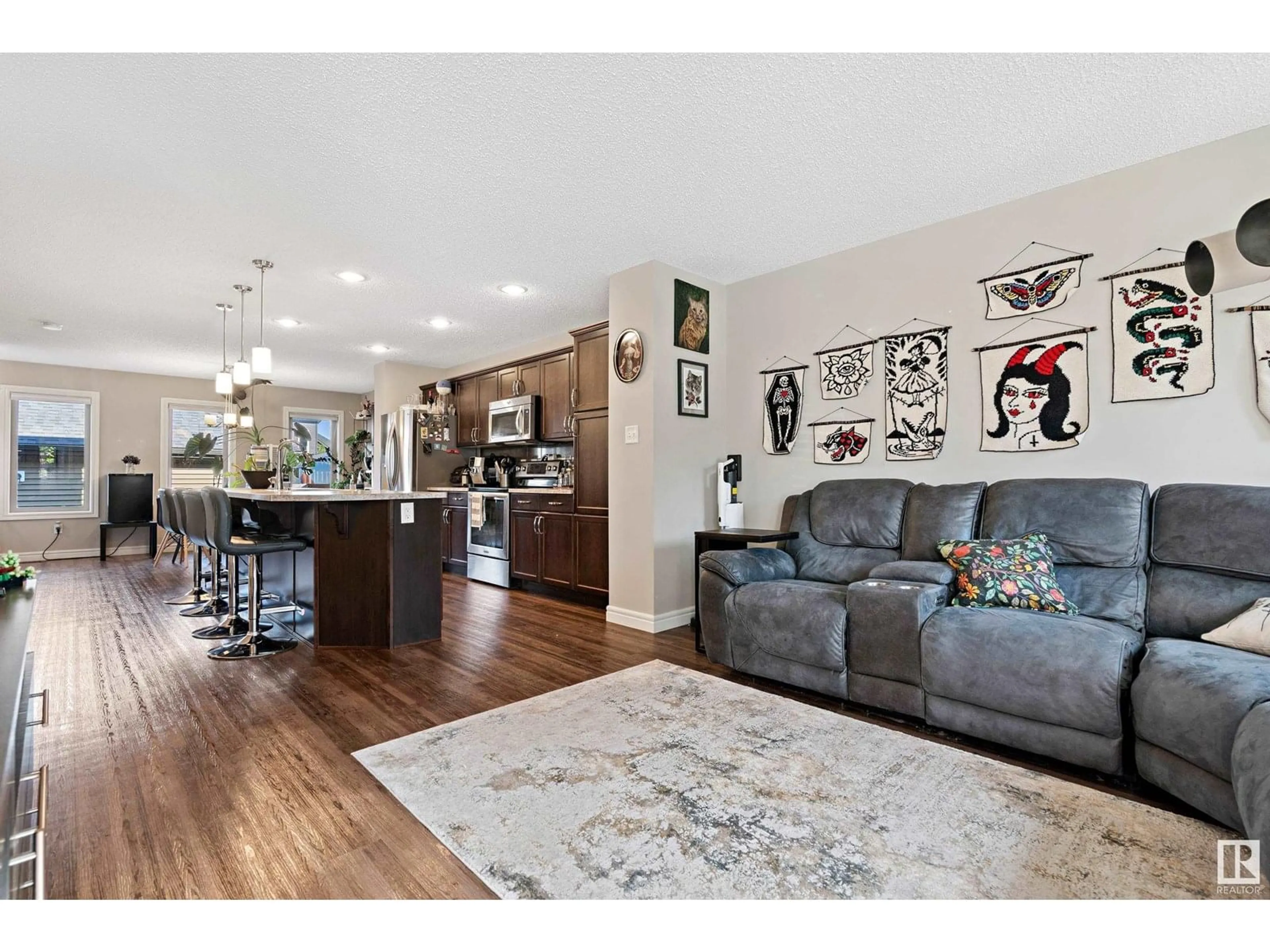 Open concept kitchen, wood/laminate floor for SW - 3066 KESWICK WY, Edmonton Alberta T6W2R2