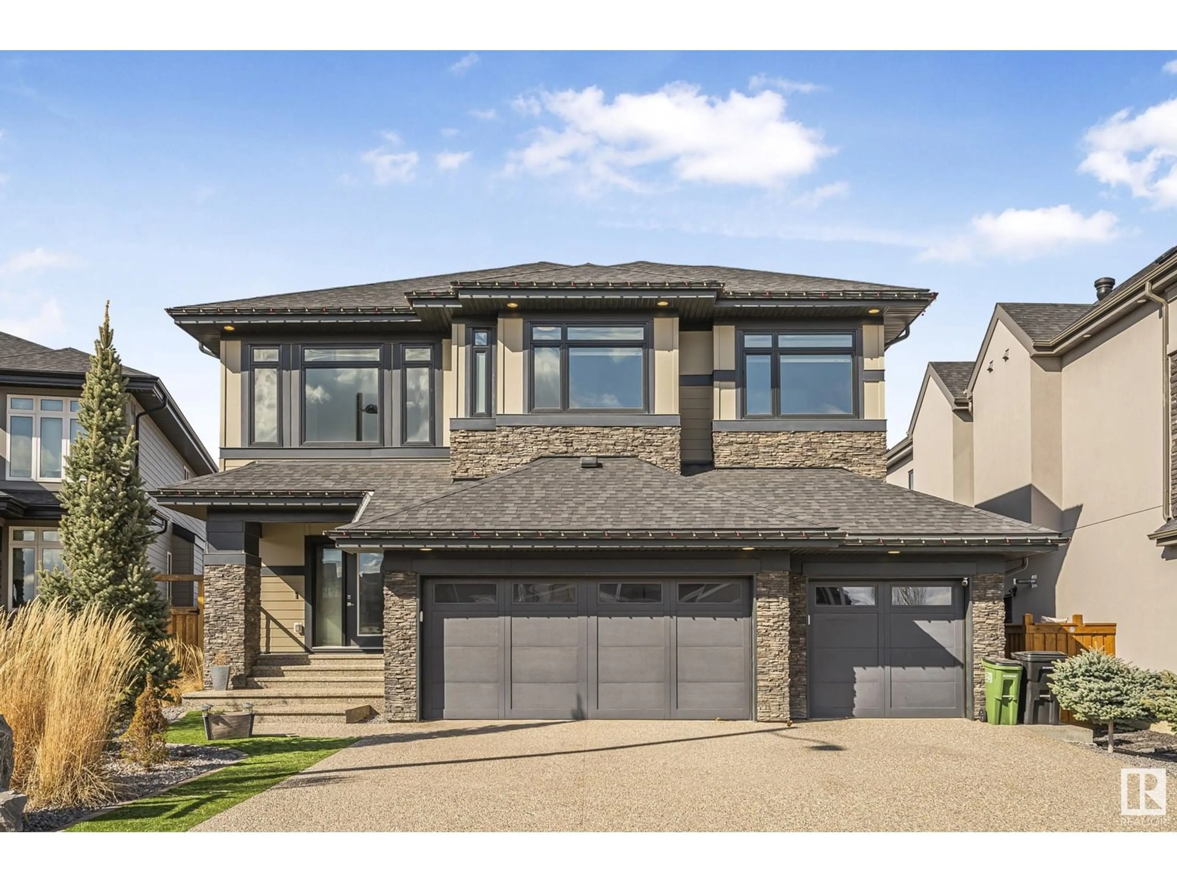 Home with brick exterior material, street for 1197 HAINSTOCK GR, Edmonton Alberta T6W3B6