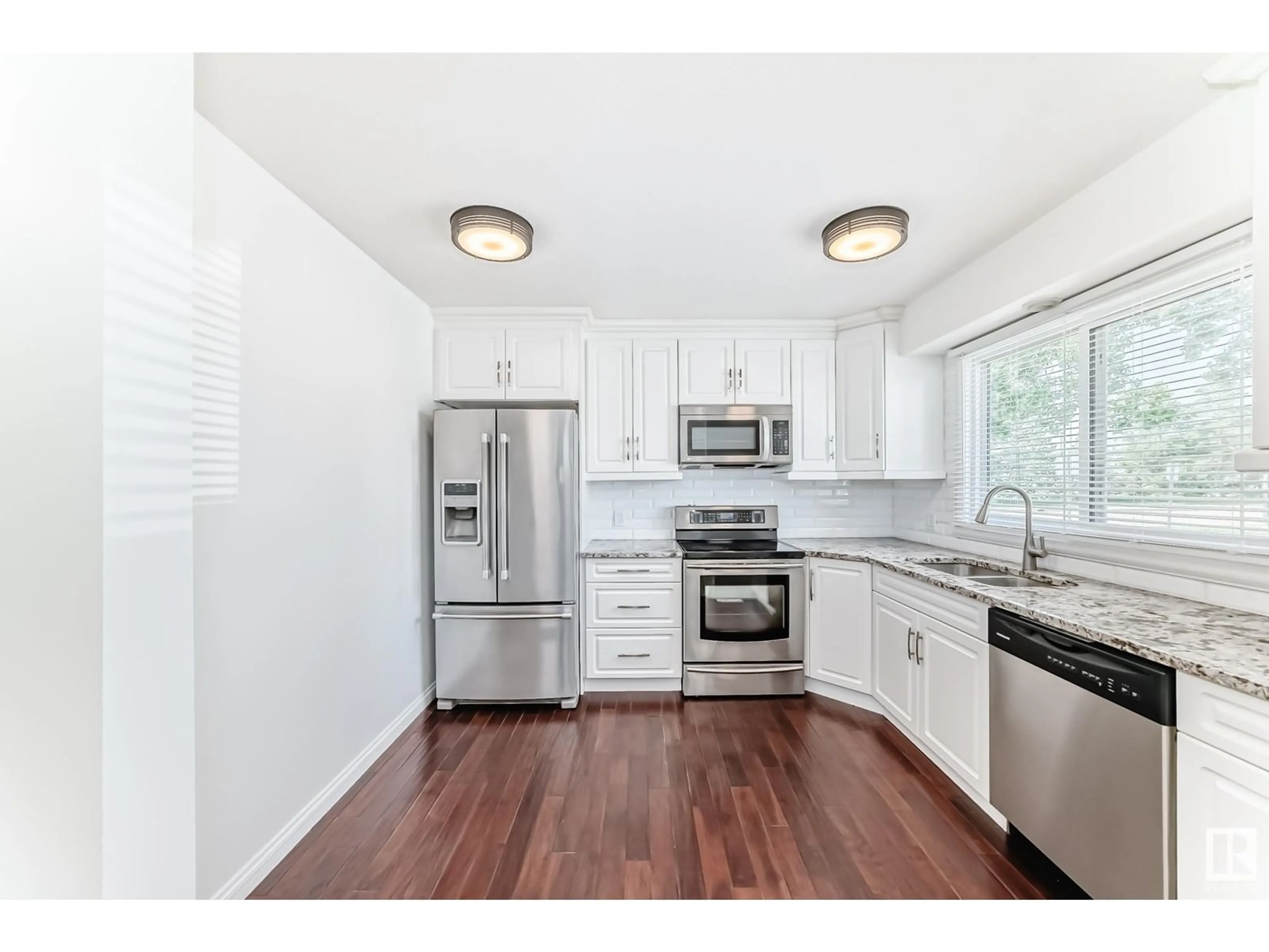 Open concept kitchen, unknown for 18008 93 AV, Edmonton Alberta T5T1Y1