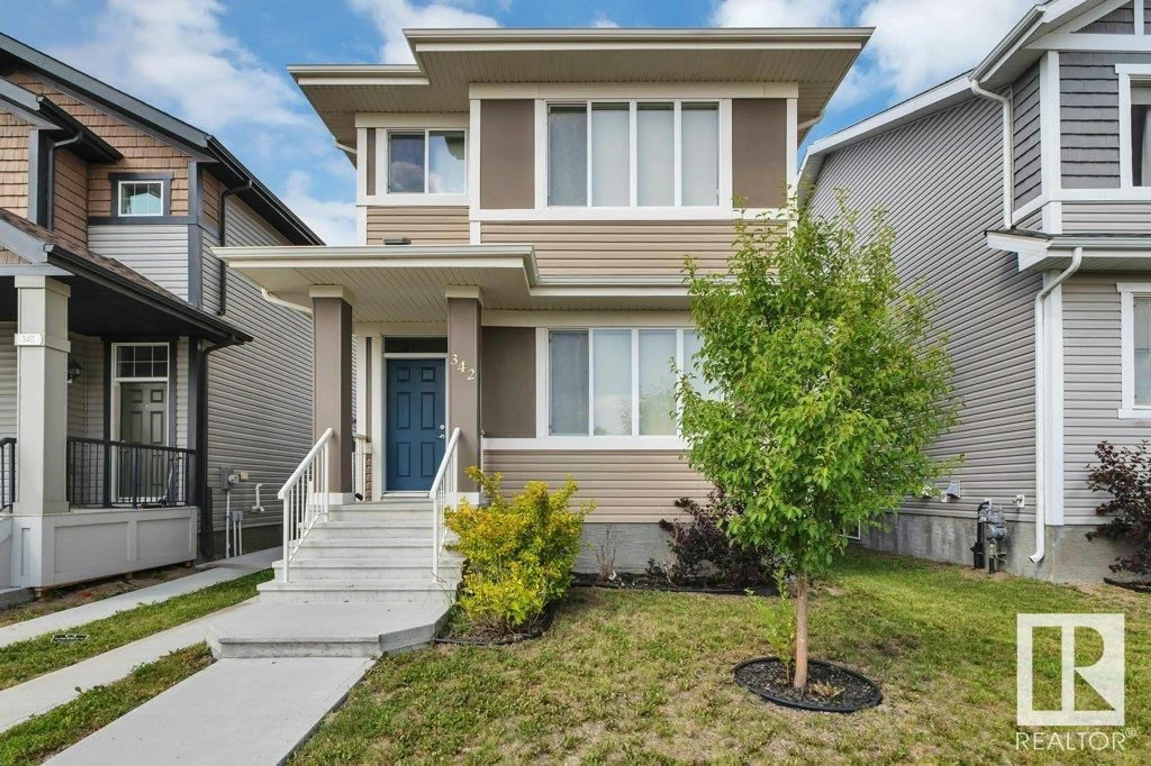 Home with vinyl exterior material, street for 342 WEST HAVEN DR, Leduc Alberta T9E1J2