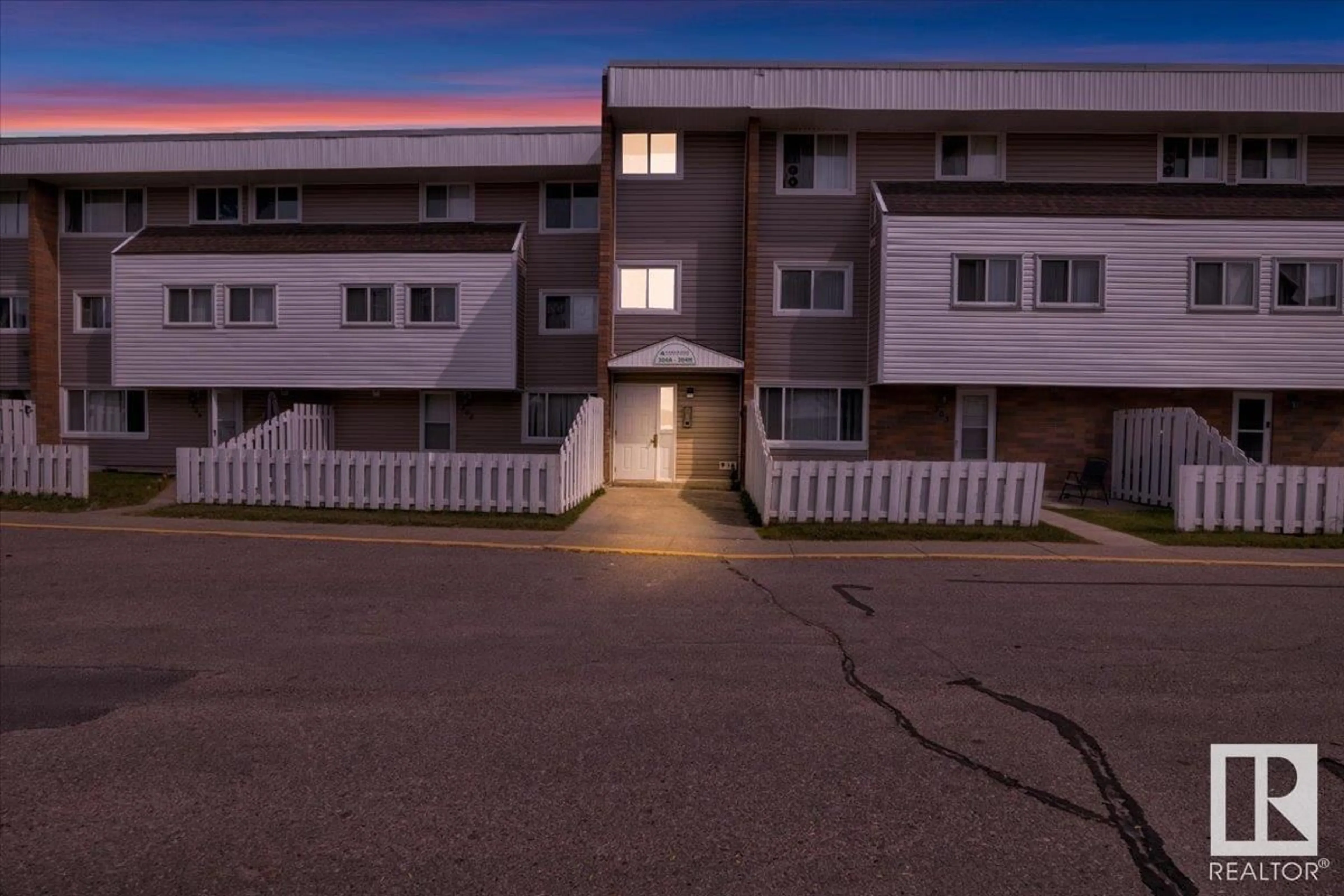 A pic from outside/outdoor area/front of a property/back of a property/a pic from drone, street for 304E - 2908 116A AVE NW, Edmonton Alberta T5W4R7
