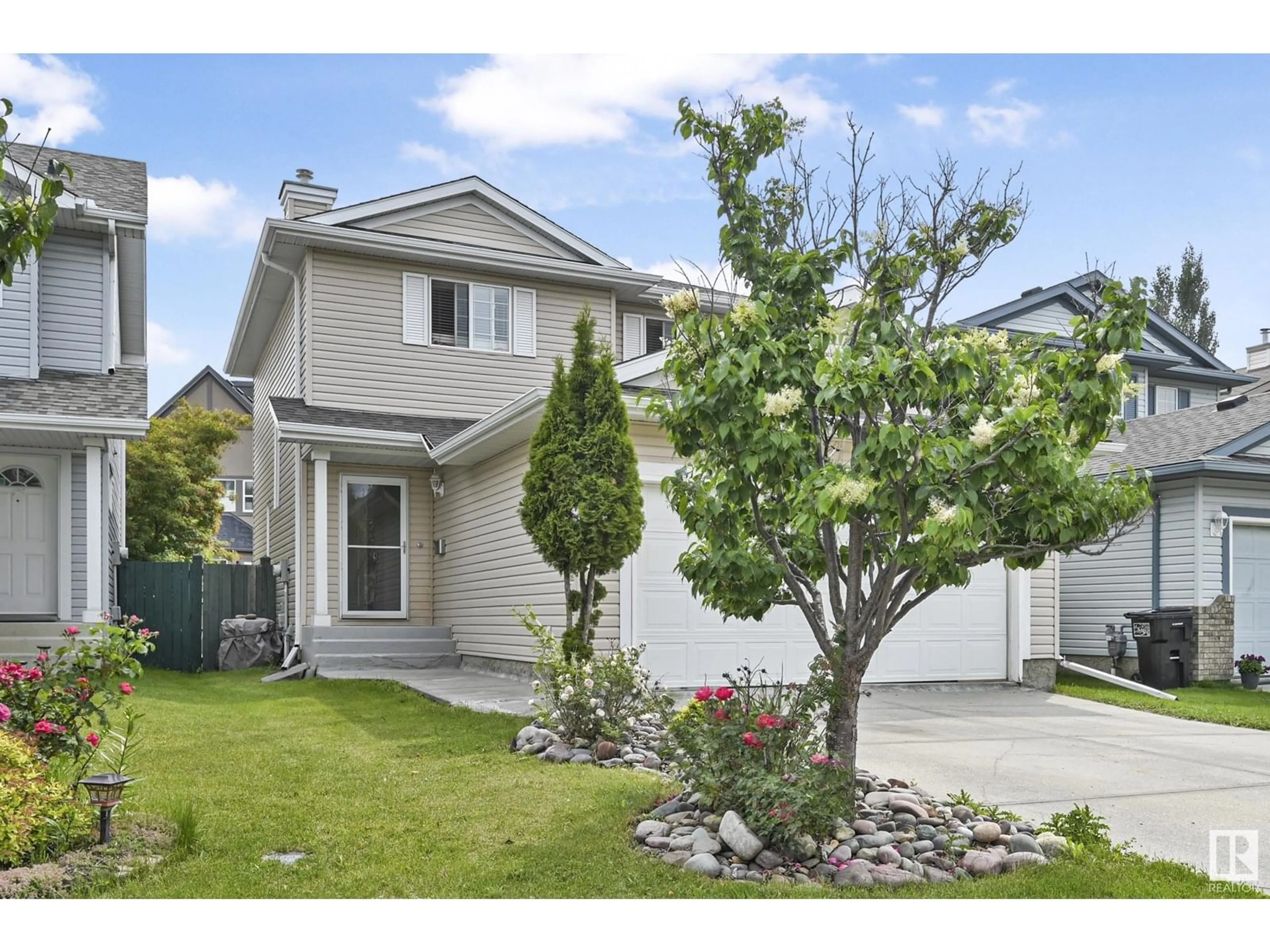 Home with vinyl exterior material, street for 1857 GARNETT WY, Edmonton Alberta T5T6R3