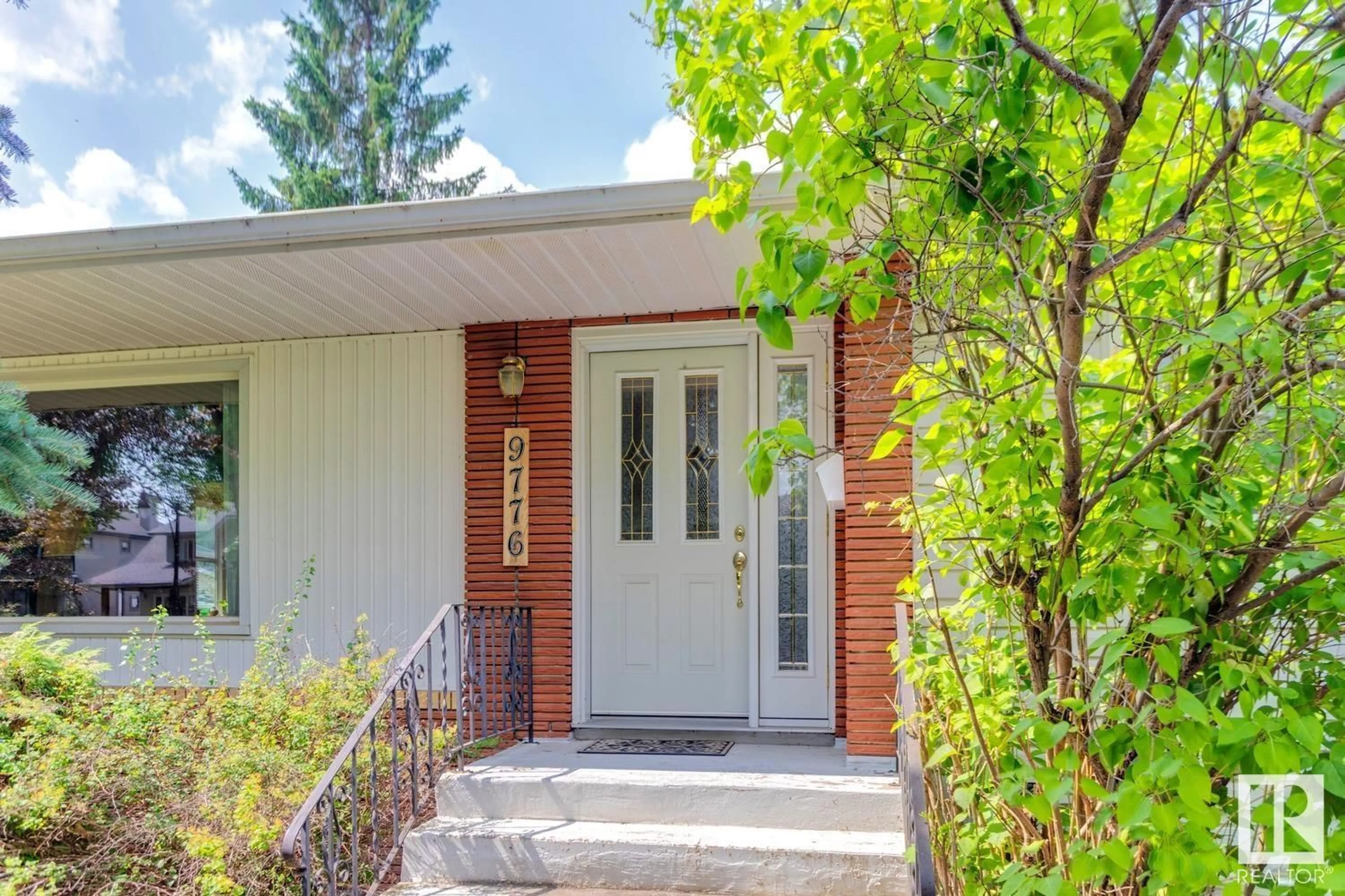 Home with brick exterior material, street for 9776 146 ST, Edmonton Alberta T5N2Z4