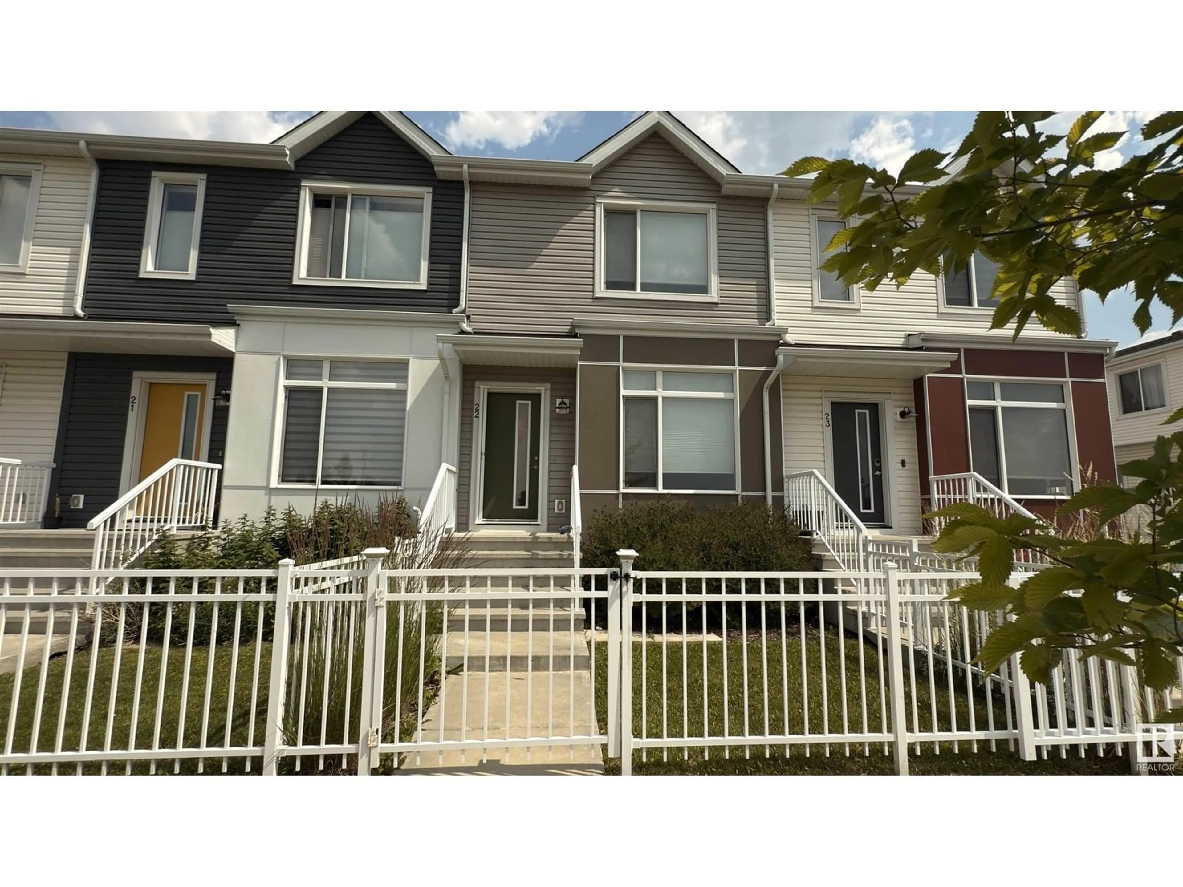 Home with vinyl exterior material, street for 22 215 SADDLEBACK RD, Edmonton Alberta T6J5T6