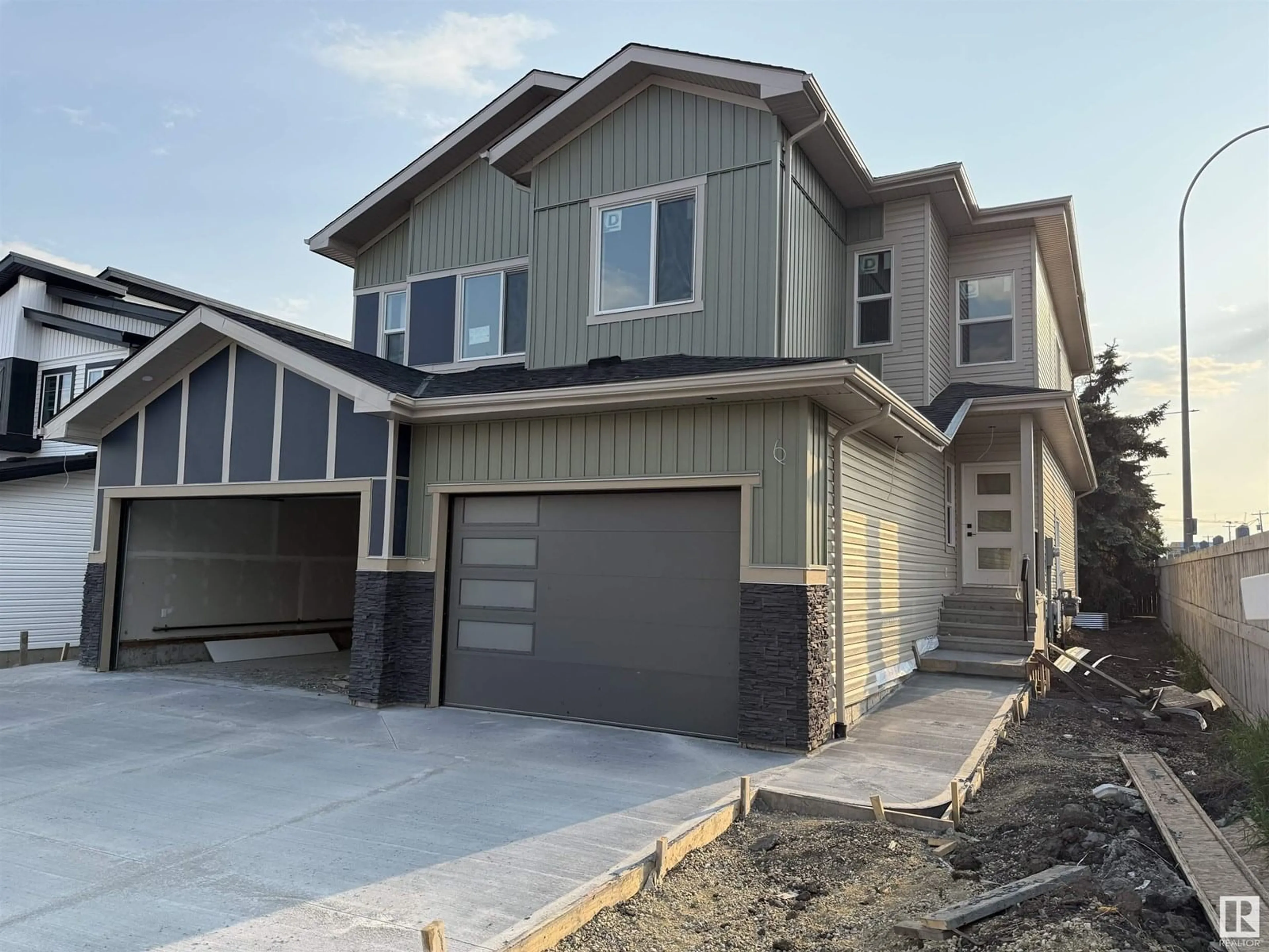 Home with vinyl exterior material, street for 4912 46 ST, Beaumont Alberta T6X1H9