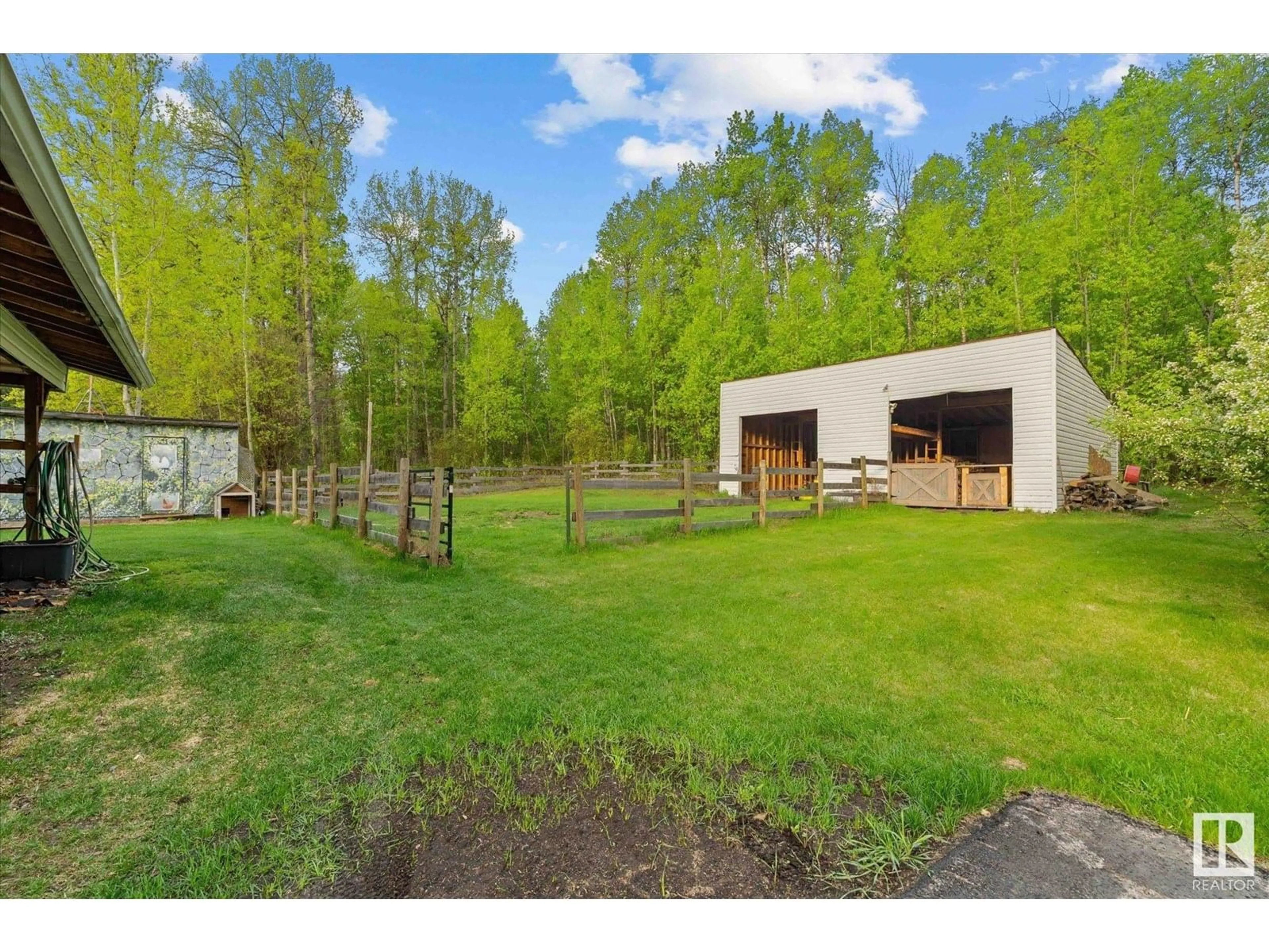 A pic from outside/outdoor area/front of a property/back of a property/a pic from drone, forest/trees view for 54113 RGE ROAD 13, Rural Parkland County Alberta T7Y0J2